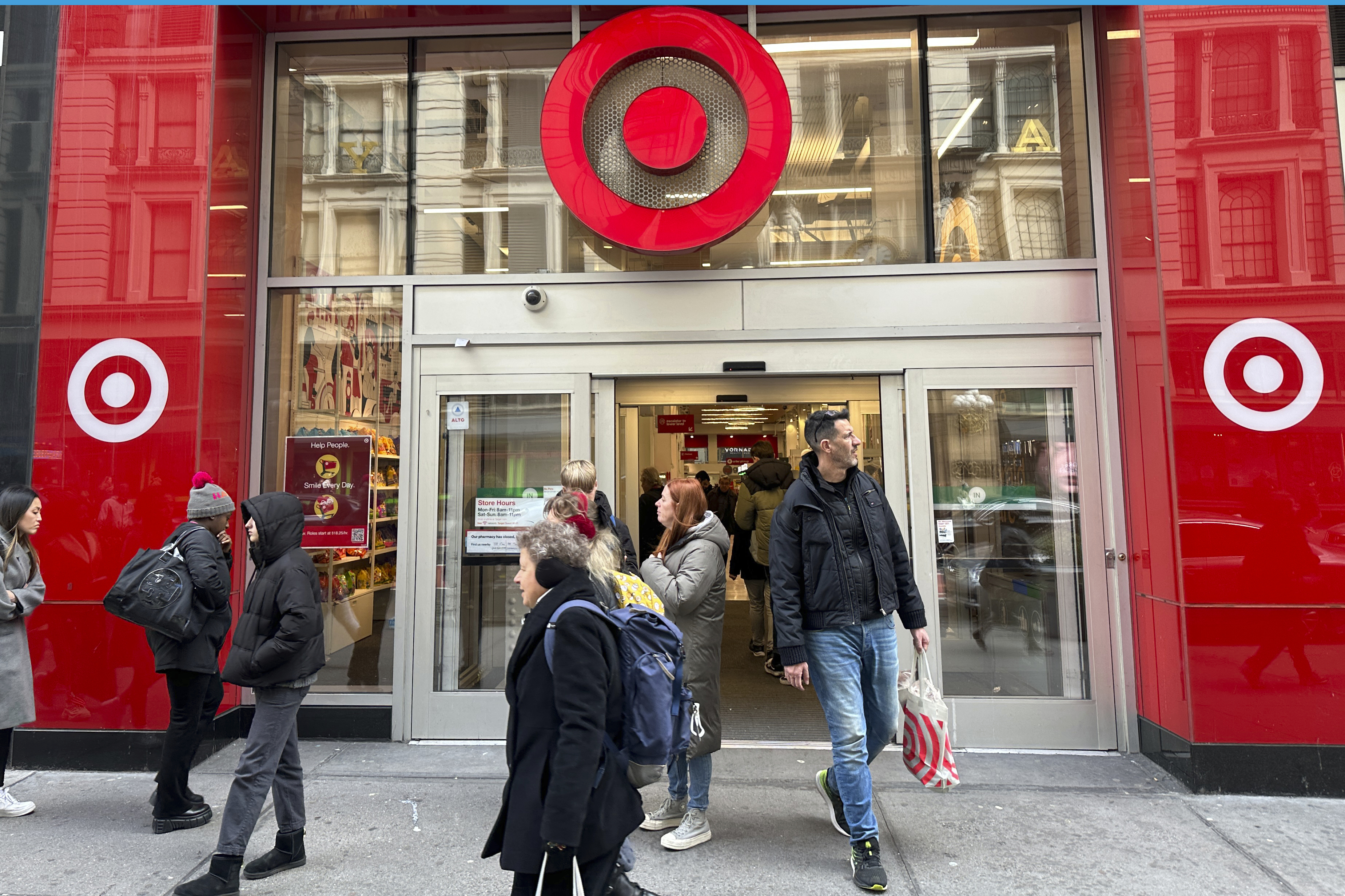 Shoppers leave a Target store in midtown Manhattan in New York on March 19.