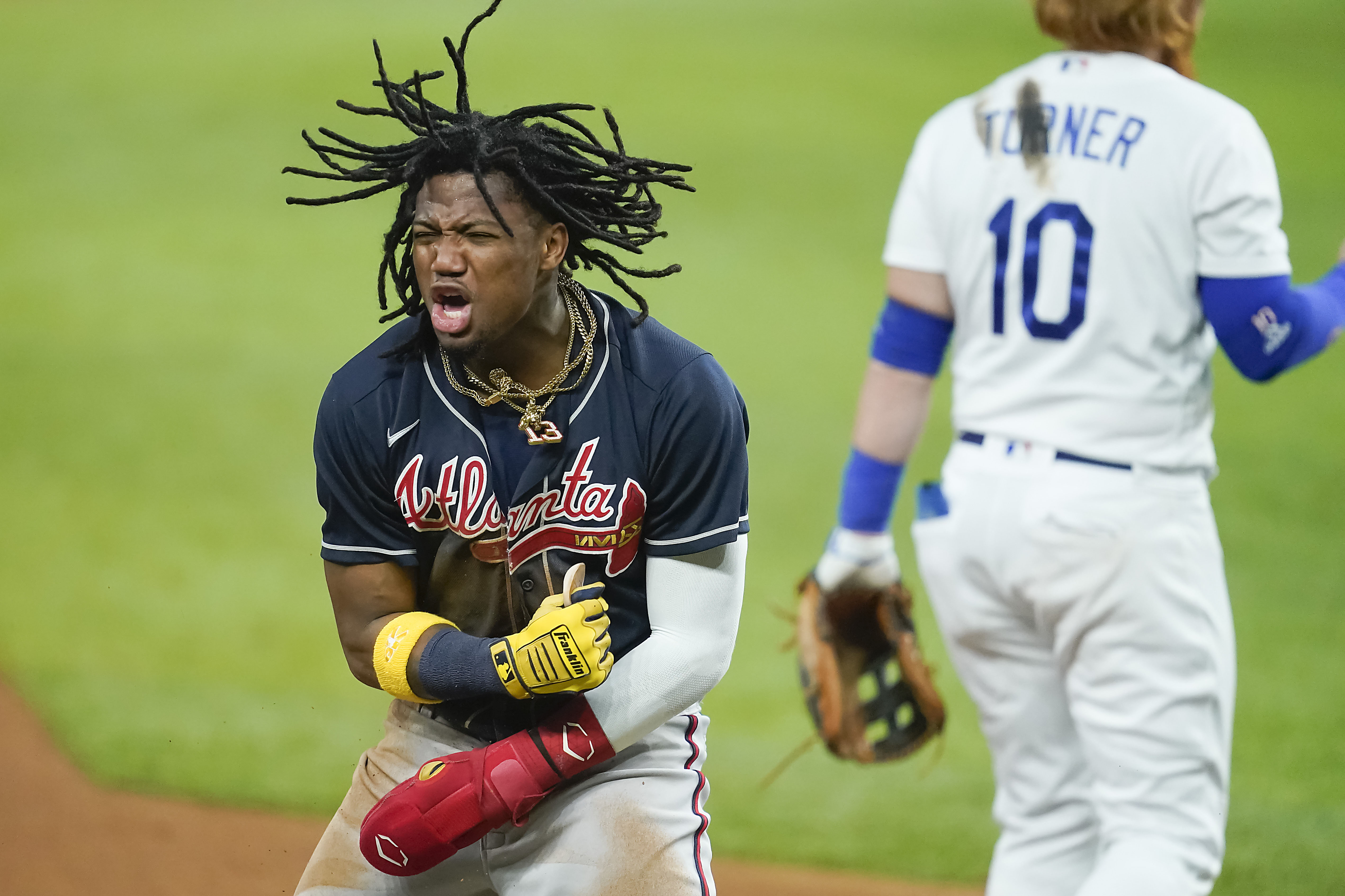 Braves maintain perfect postseason record, hang on late against Dodgers to  take 2-0 lead in NLCS