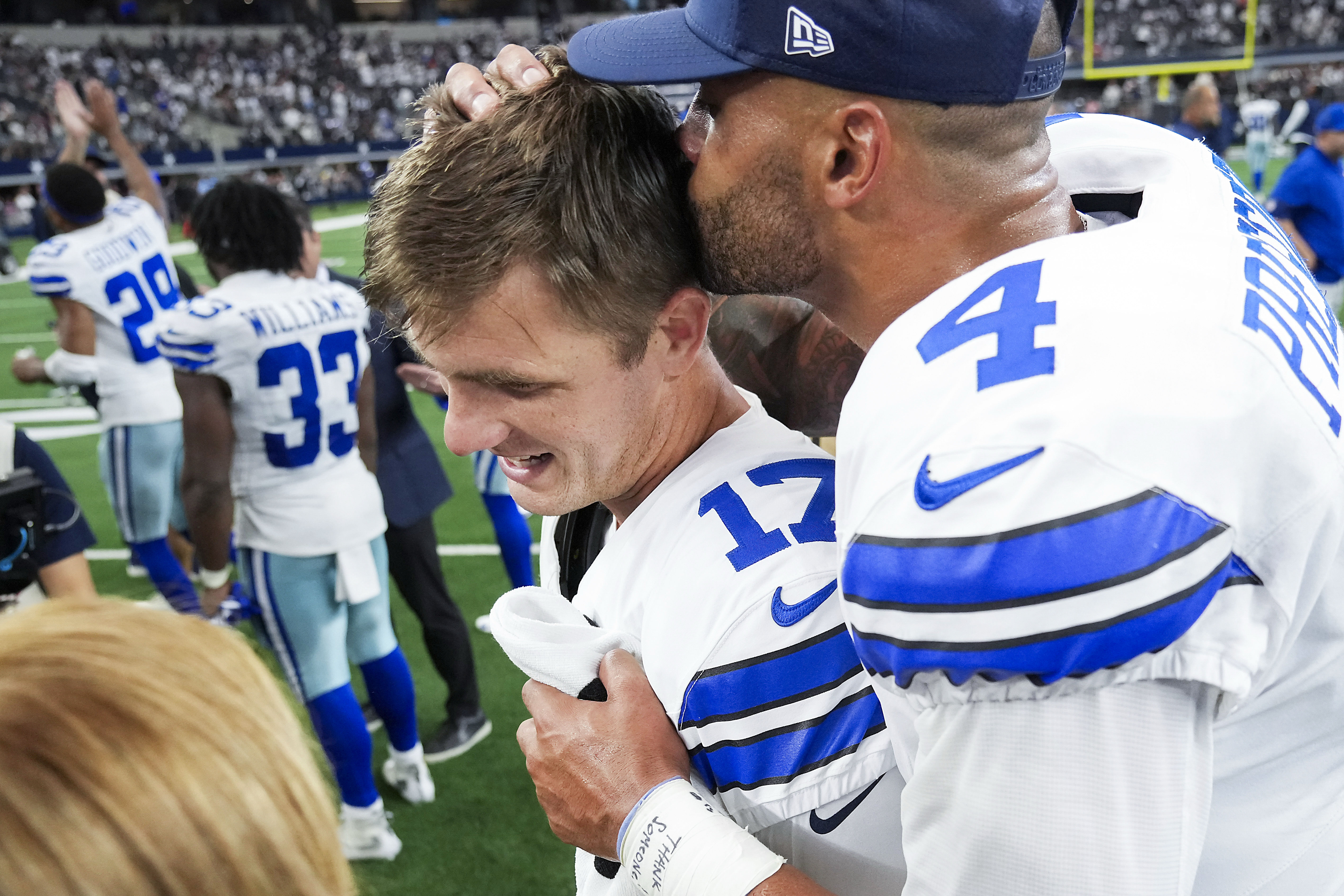 Victory smooch: See photos as Cowboys celebrate overtime win vs. Giants