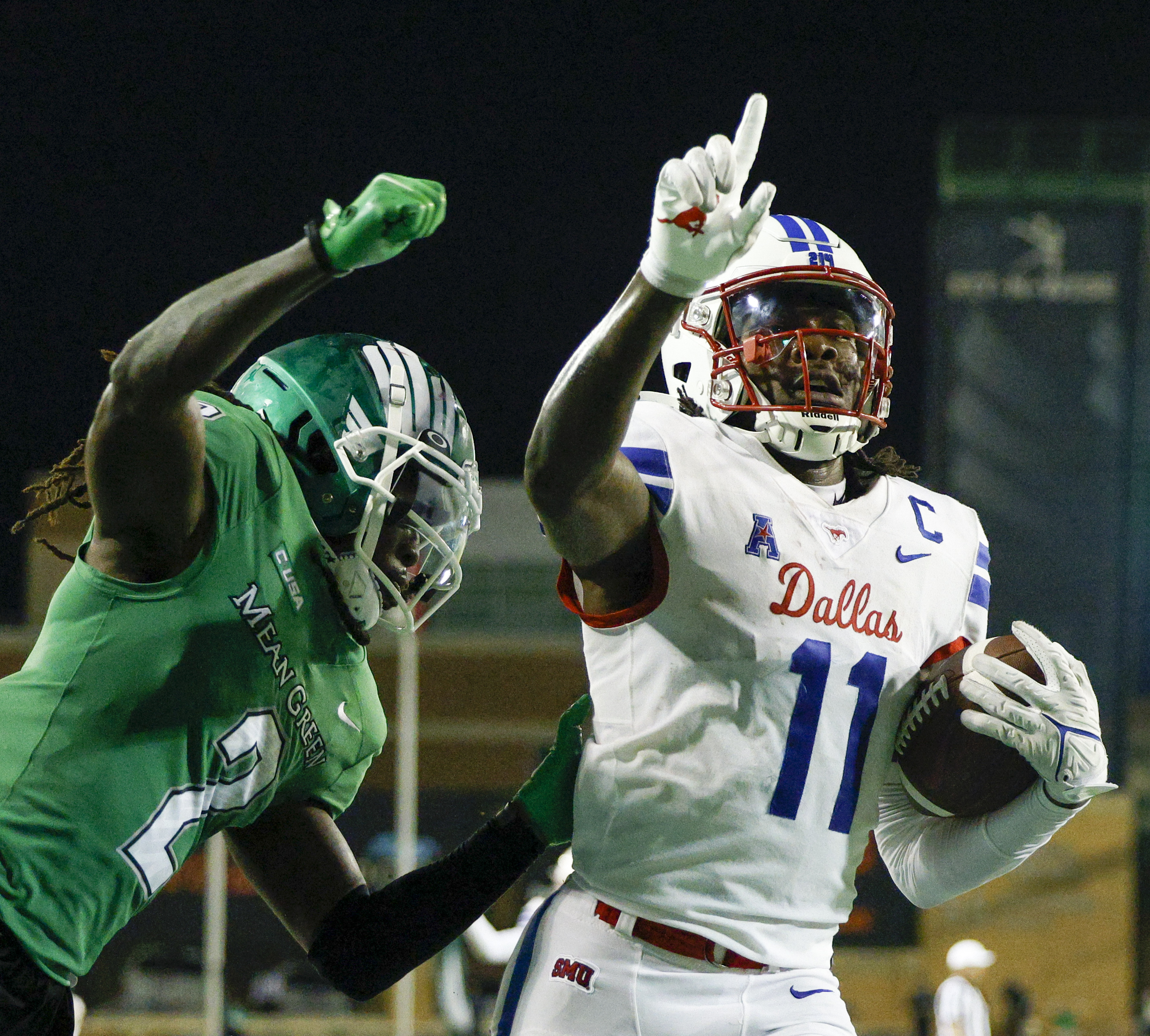 SMU wide receiver Rashee Rice (11) celebrated a touchdown catch in the end zone ahead of UNT...