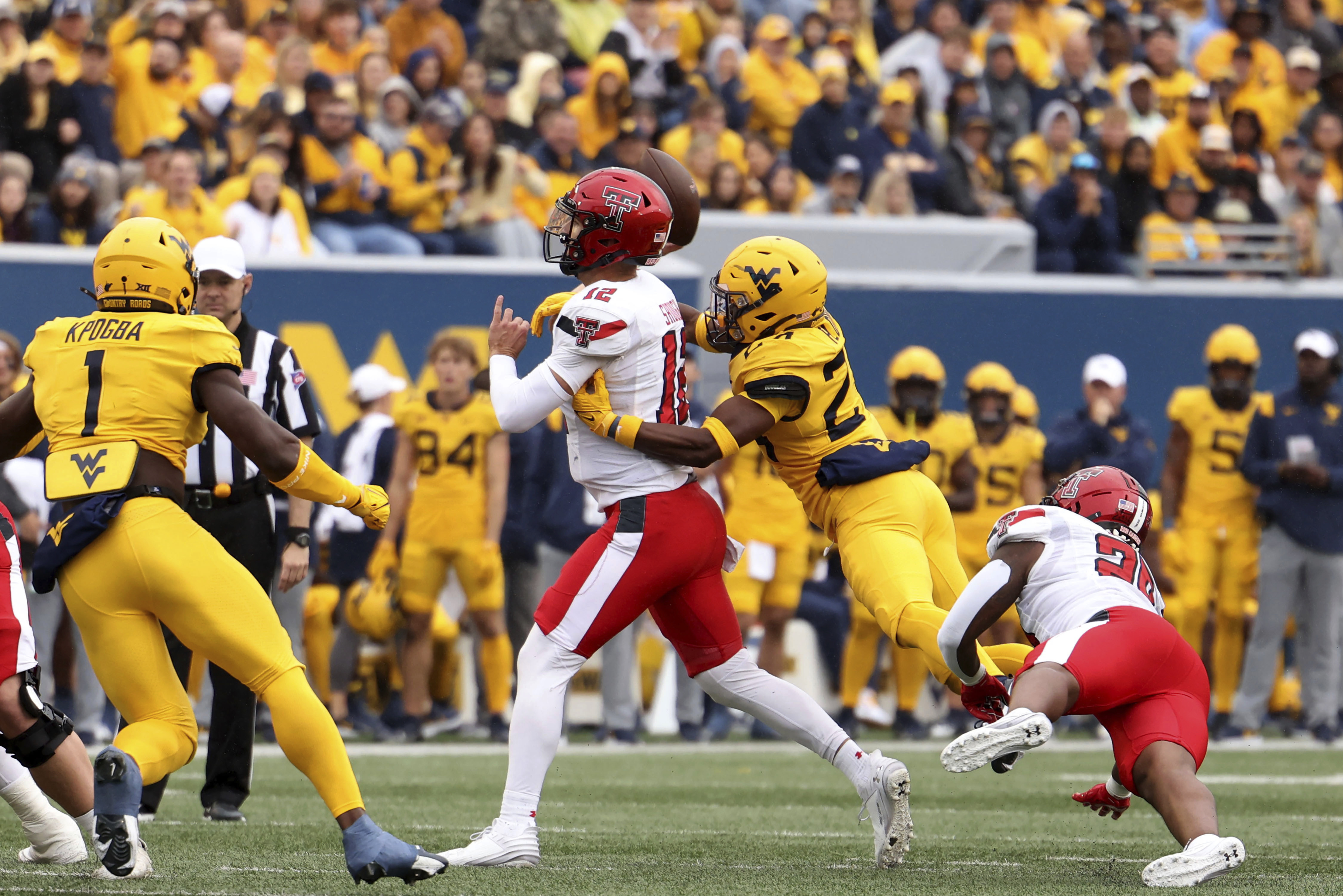 2 West Virginia football players carted off field are set to return to  campus