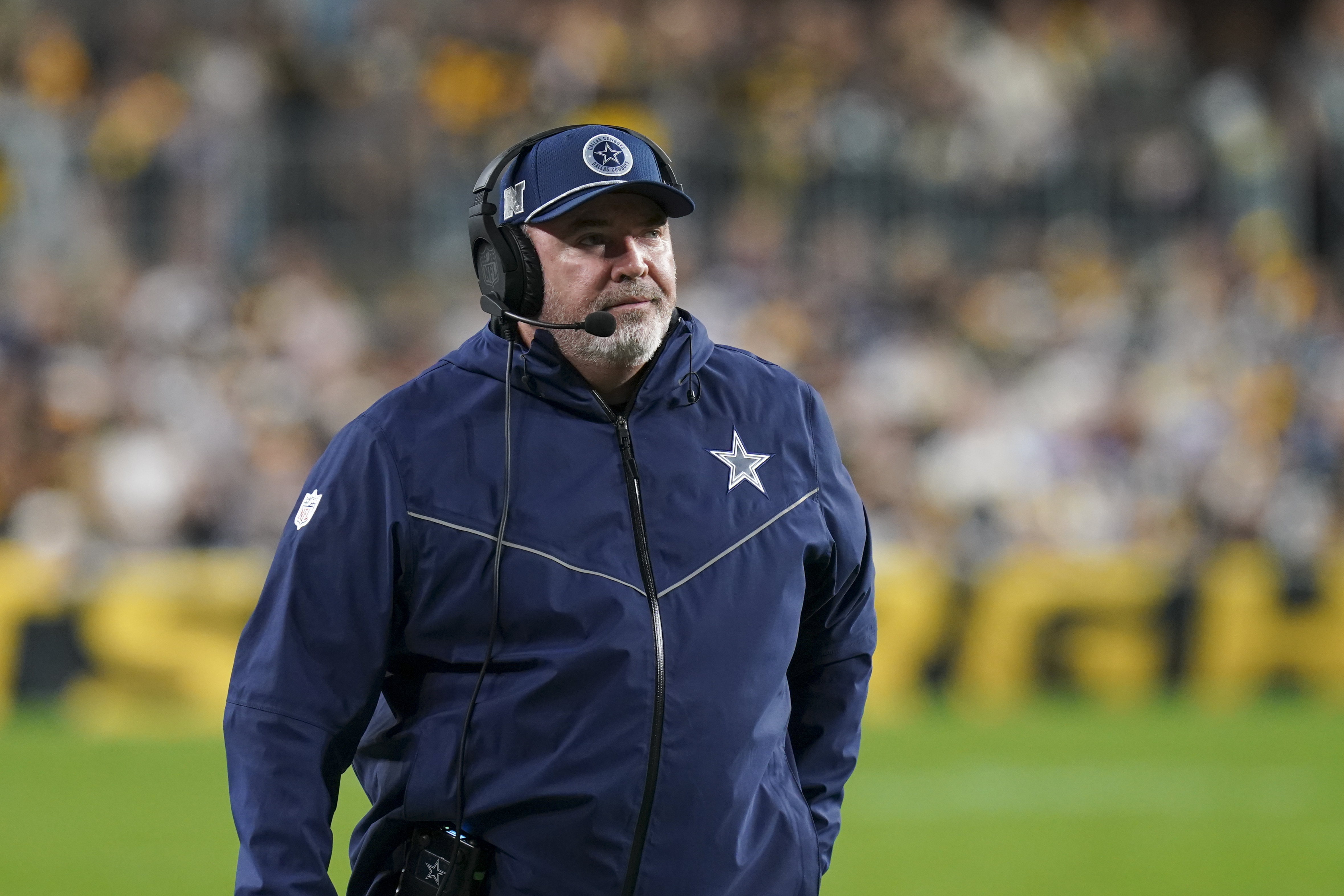 Mike McCarthy on the sideline during his time as Dallas Cowboys head coach