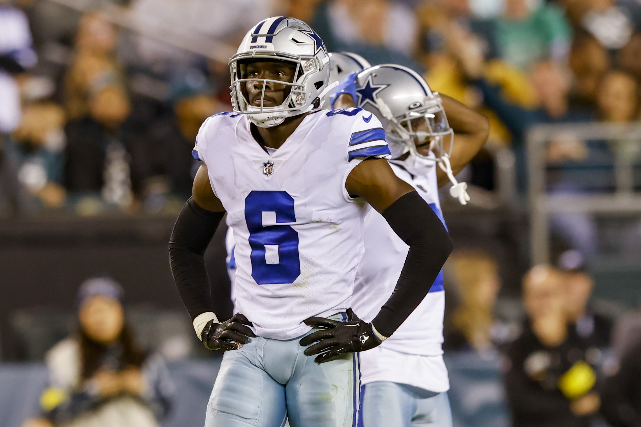 Dallas Cowboys safety Donovan Wilson (6) runs out onto the field