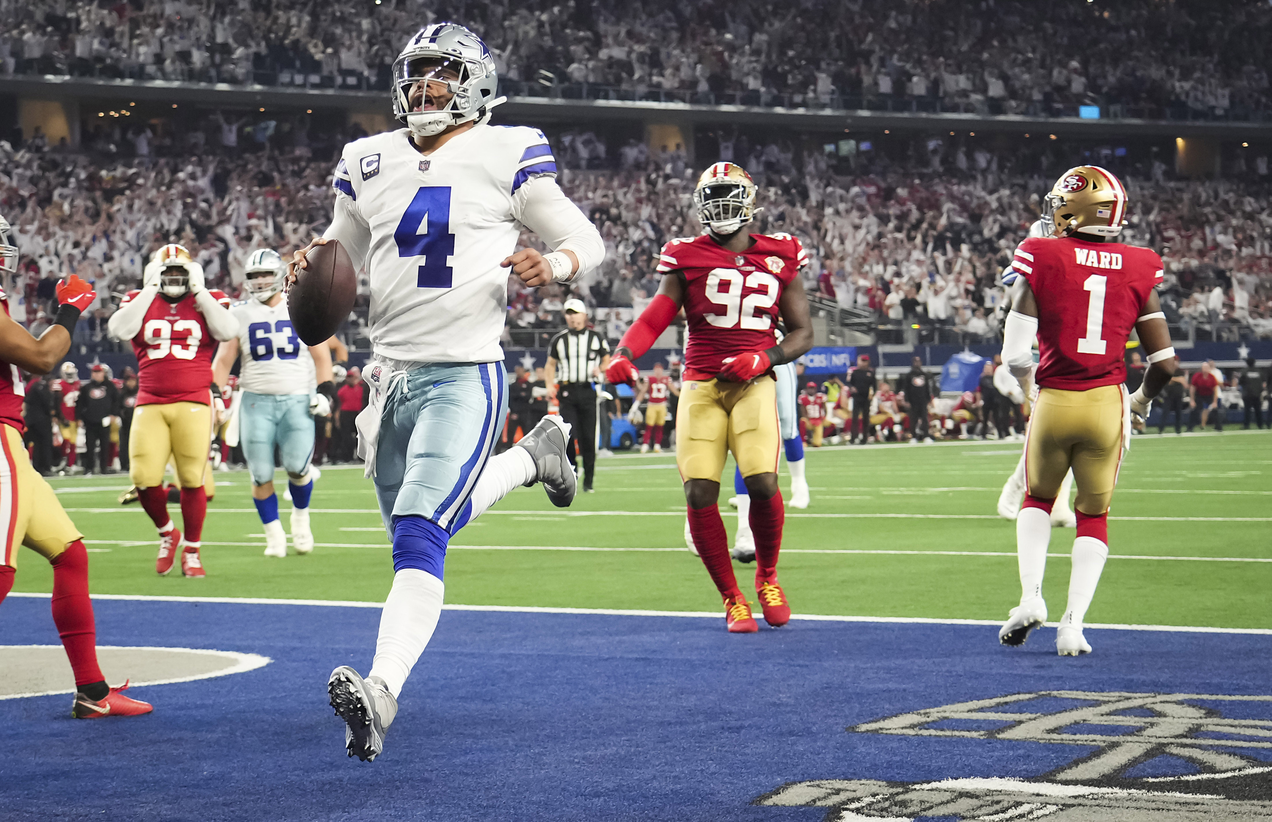 Dallas Cowboys quarterback Dak Prescott steps off the riser after