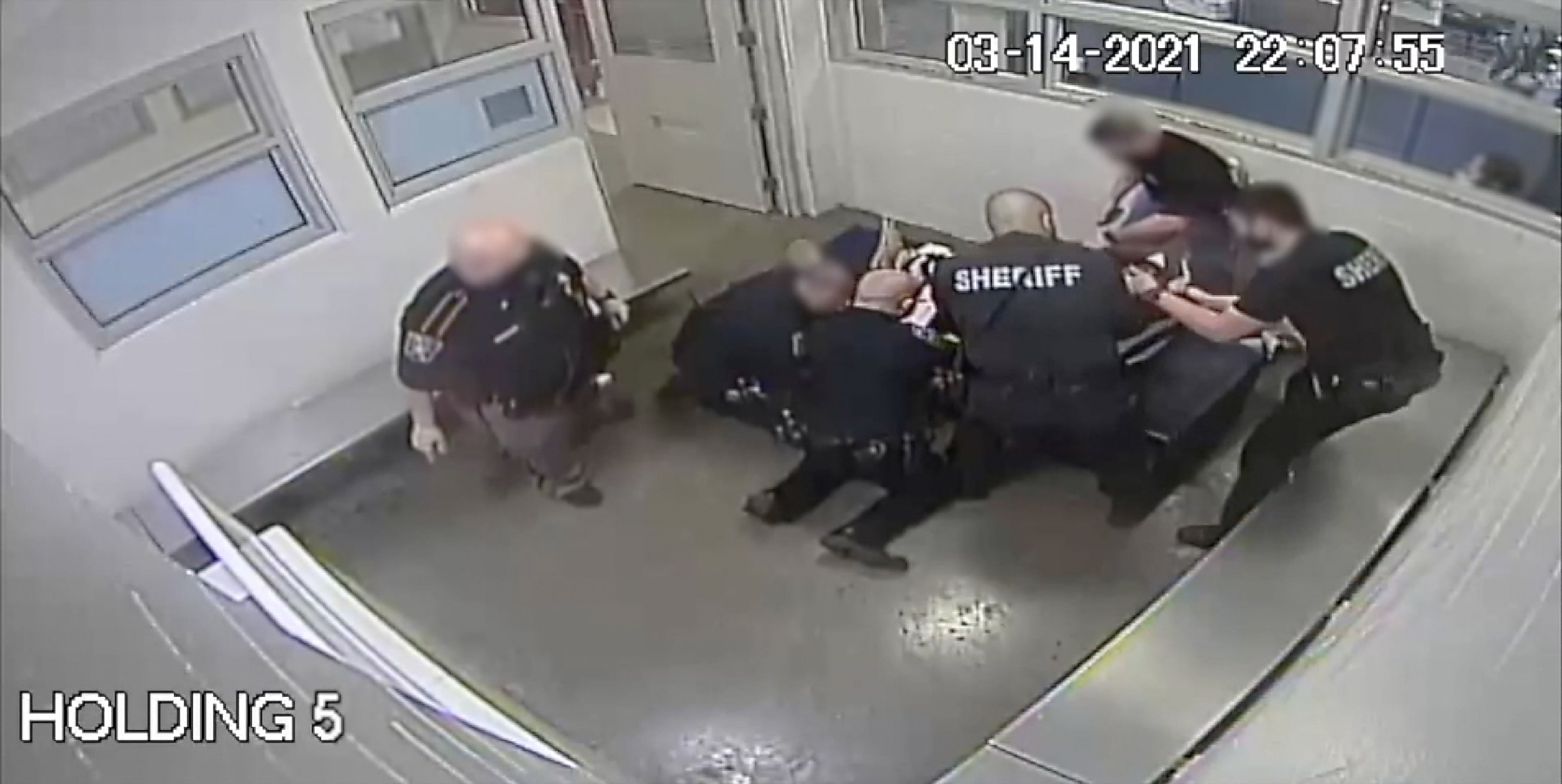 Collin County officials release video of jailers restraining Marvin Scott  III before his death