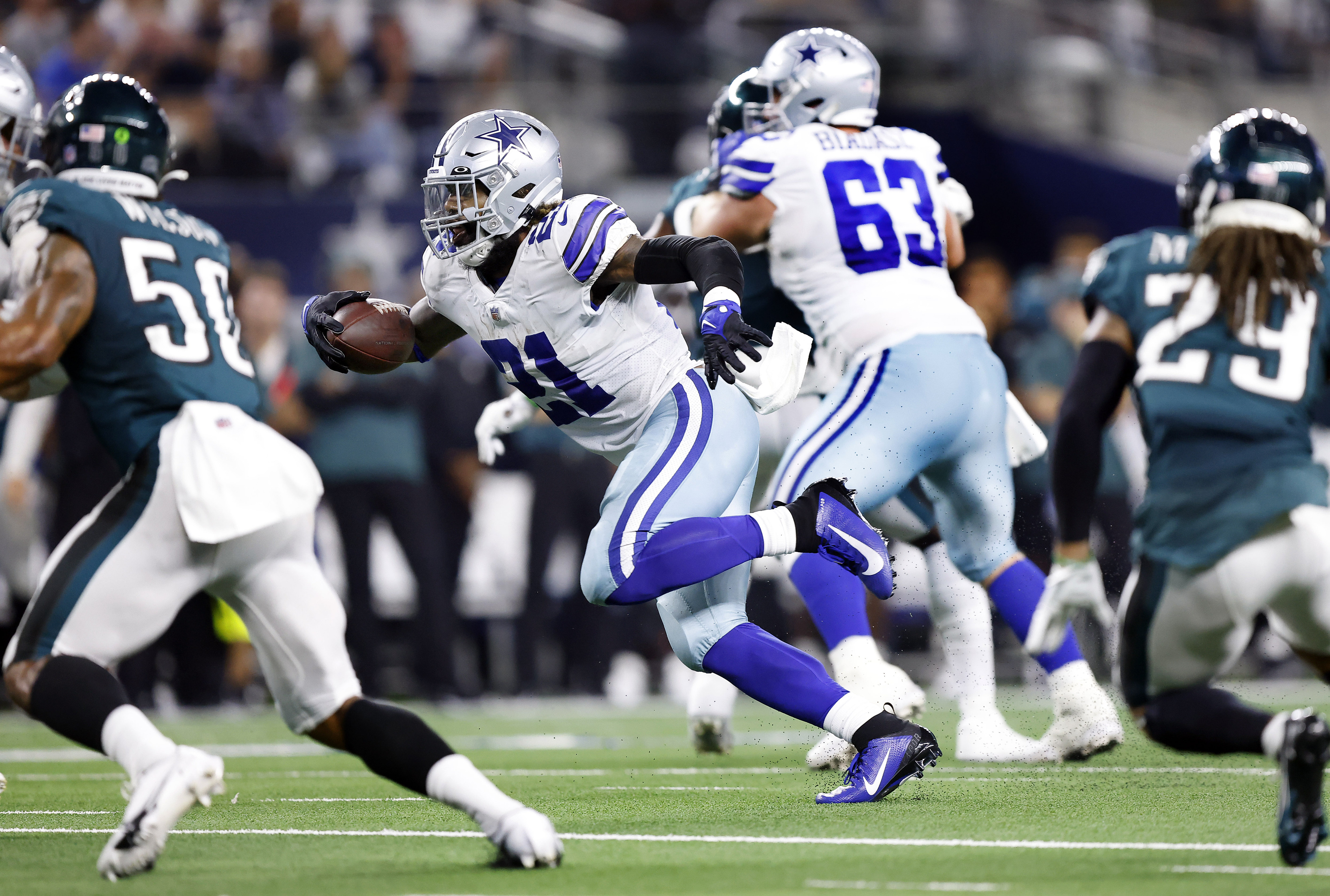 Elliott, Cowboys run over top defense, beat Panthers 36-28