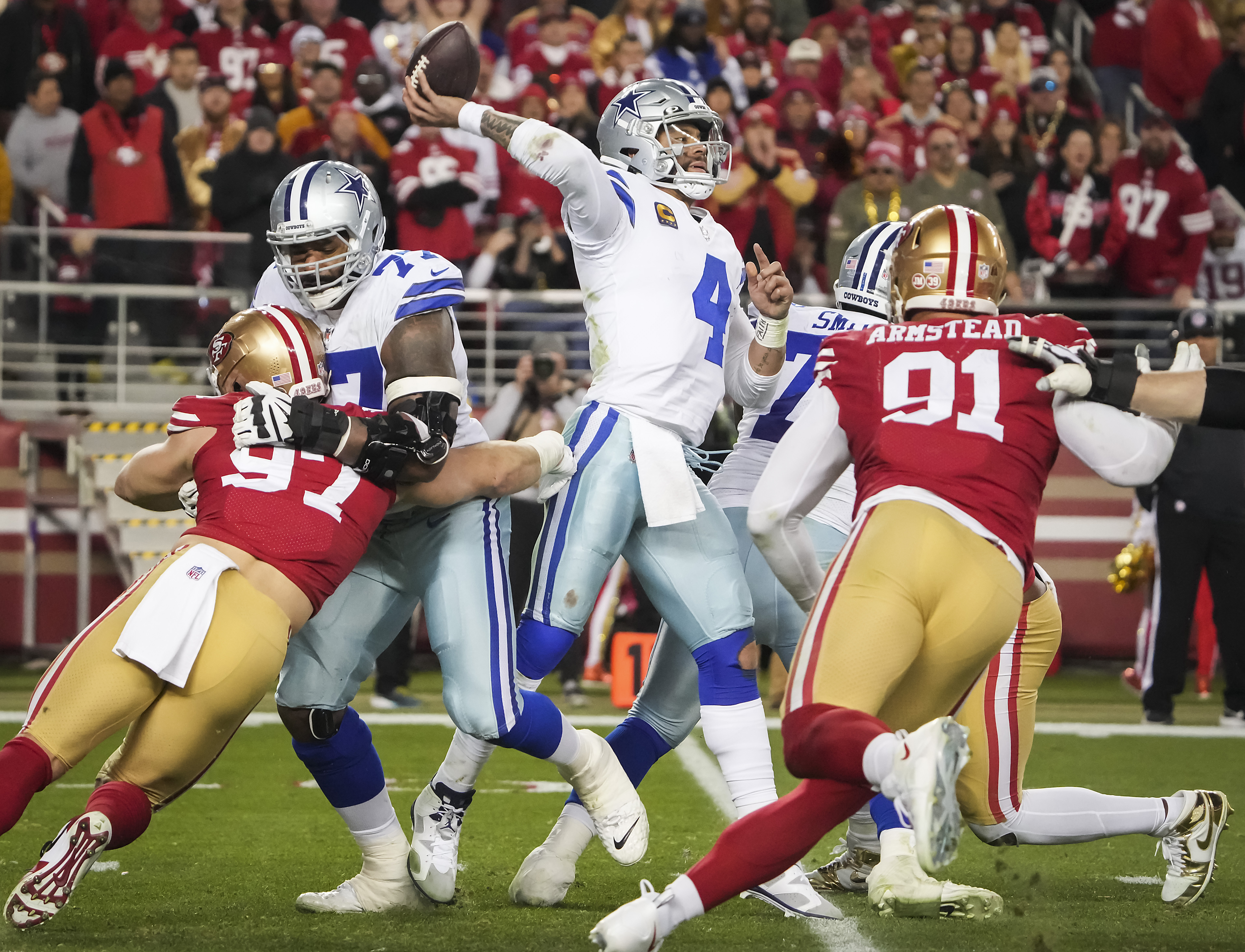 San Francisco 49ers linebacker Fred Warner (54) and Dallas Cowboys wide  receiver CeeDee Lamb (88) after a stop during an NFL divisional round  playoff football game, Sunday, Jan. 22, 2023, in Santa