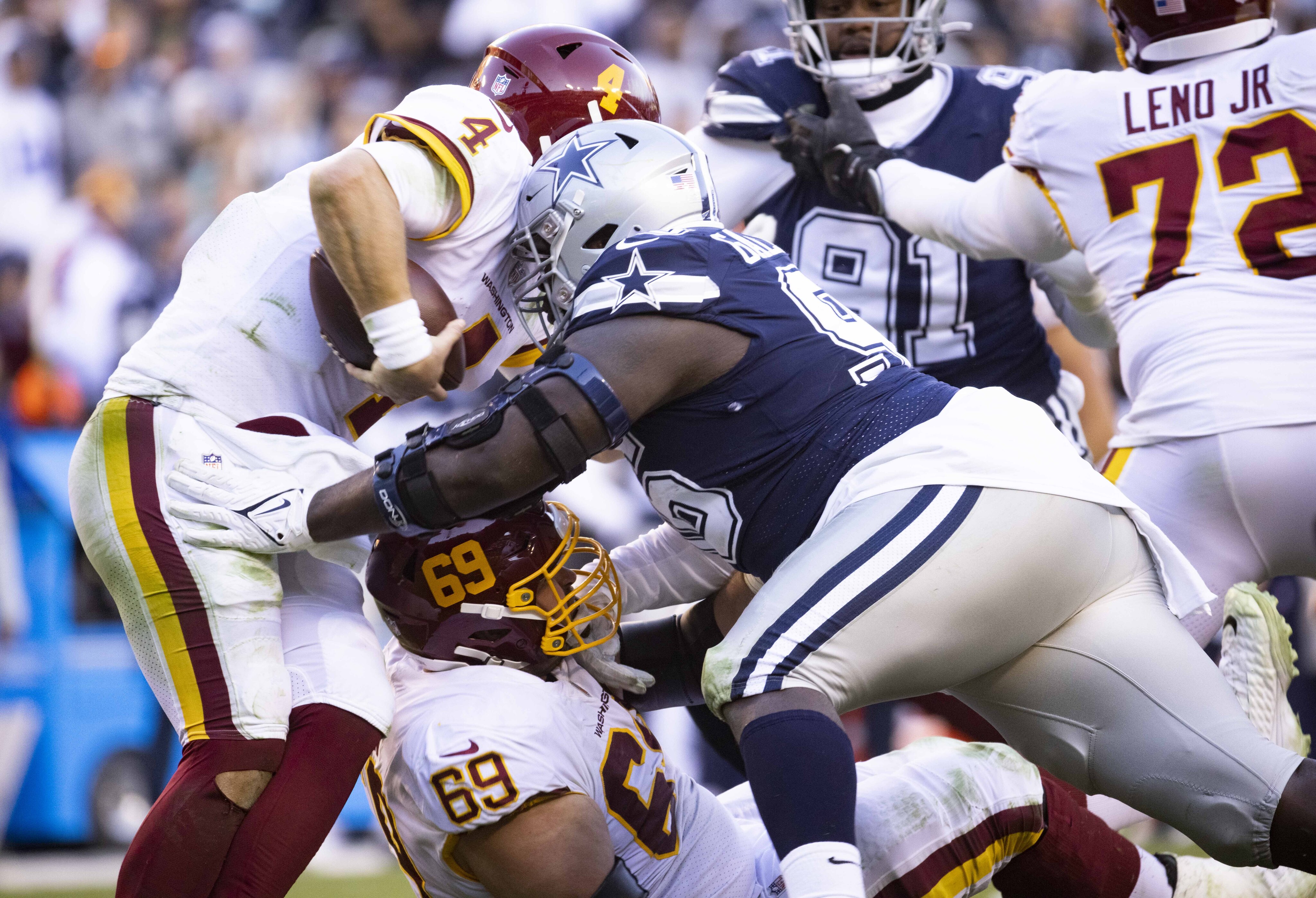 Dallas Cowboys defensive tackle Neville Gallimore (96) walks on the  sideline during the first half of an NFL preseason football game against  the Jacksonville Jaguars, Saturday, Aug. 12, 2023, in Arlington, Texas. (