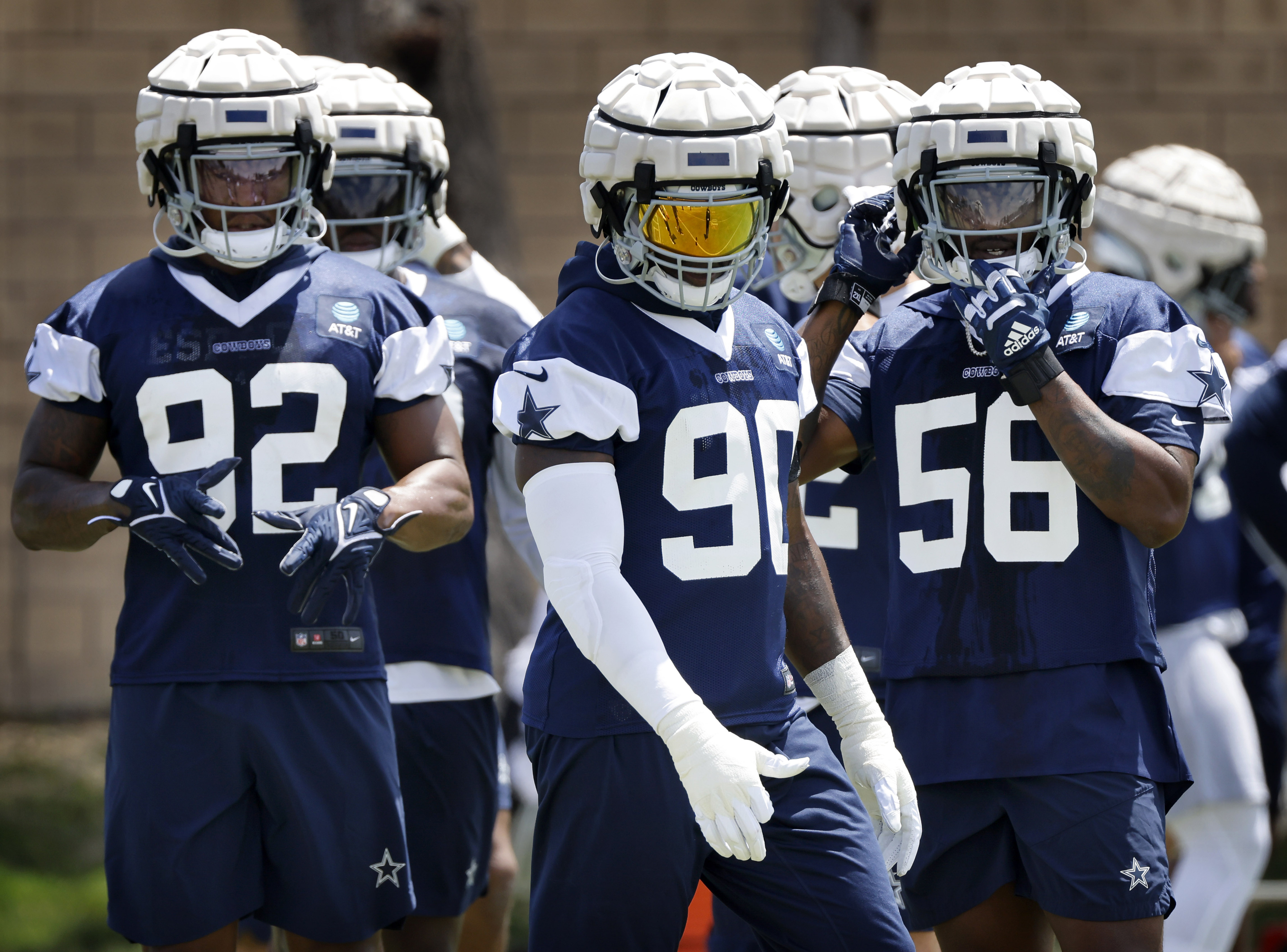 Have you seen the strange helmets Cowboys players are wearing in camp?  Here's the story