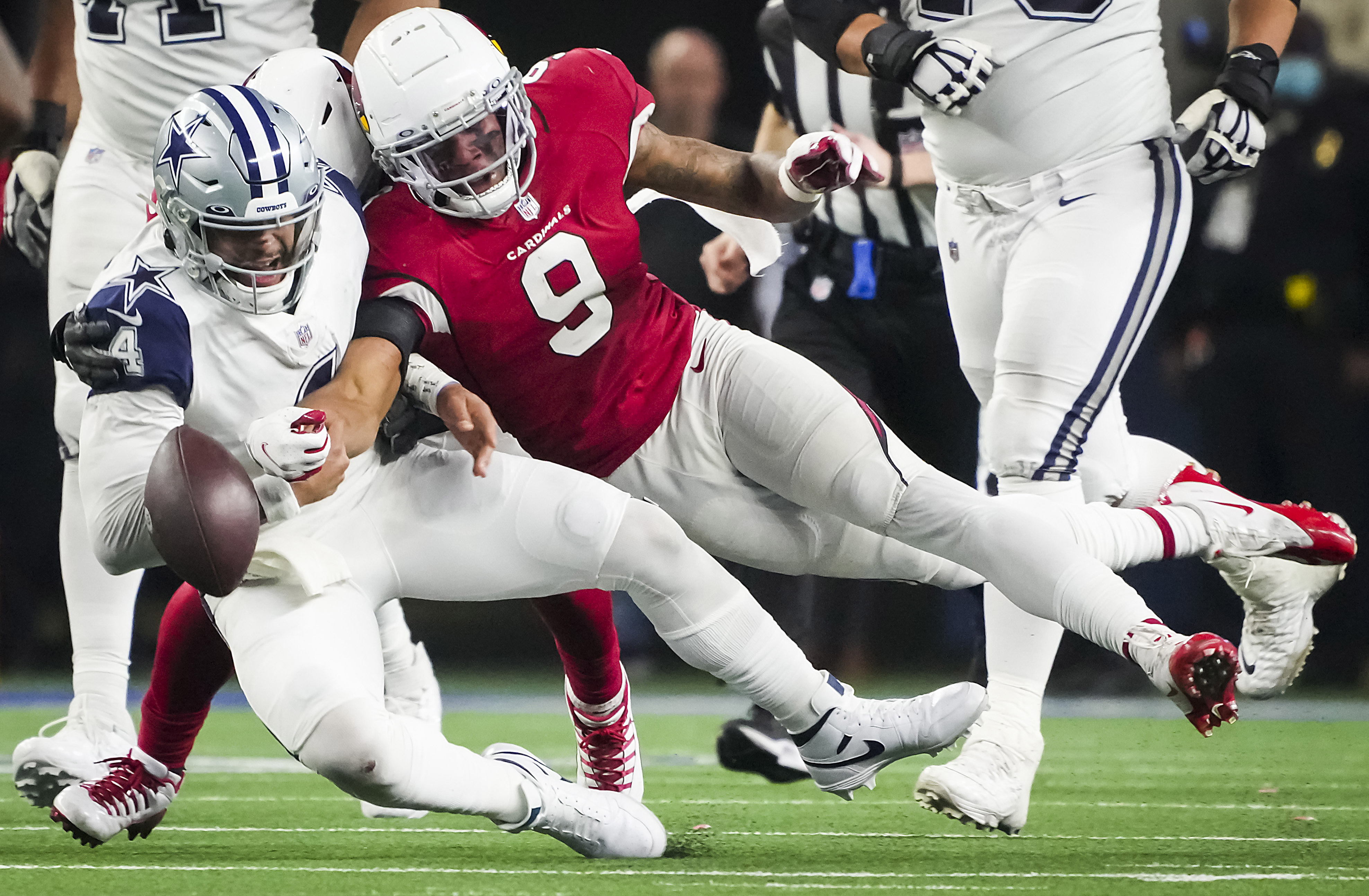 Dallas Cowboys wide receiver CeeDee Lamb (88) breaks away from Arizona  Cardinals safety Budda Baker (3) during the second half of an NFL football  game Sunday, Jan. 2, 2022, in Arlington, Texas. (