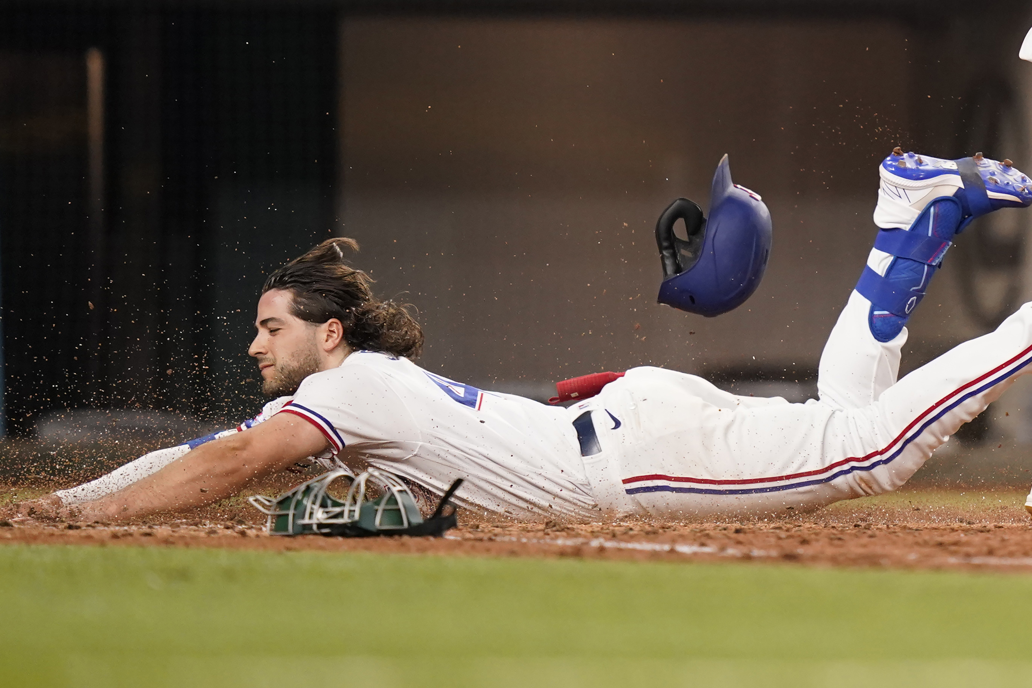 The Rangers' Josh Smith goes the unconventional route for his first big  league homer.