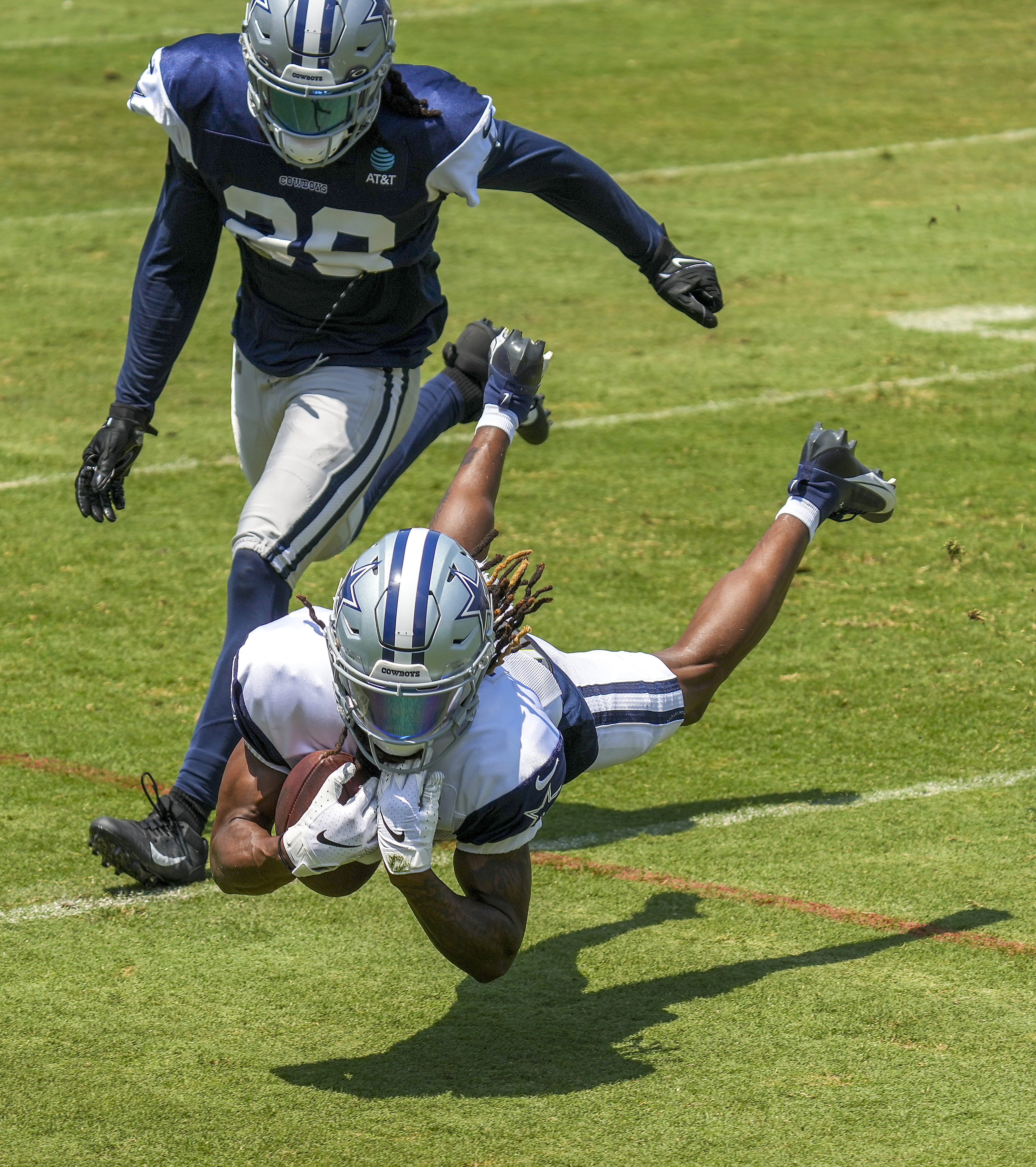 Photos: Cowboys training camp heats up with first practice in pads