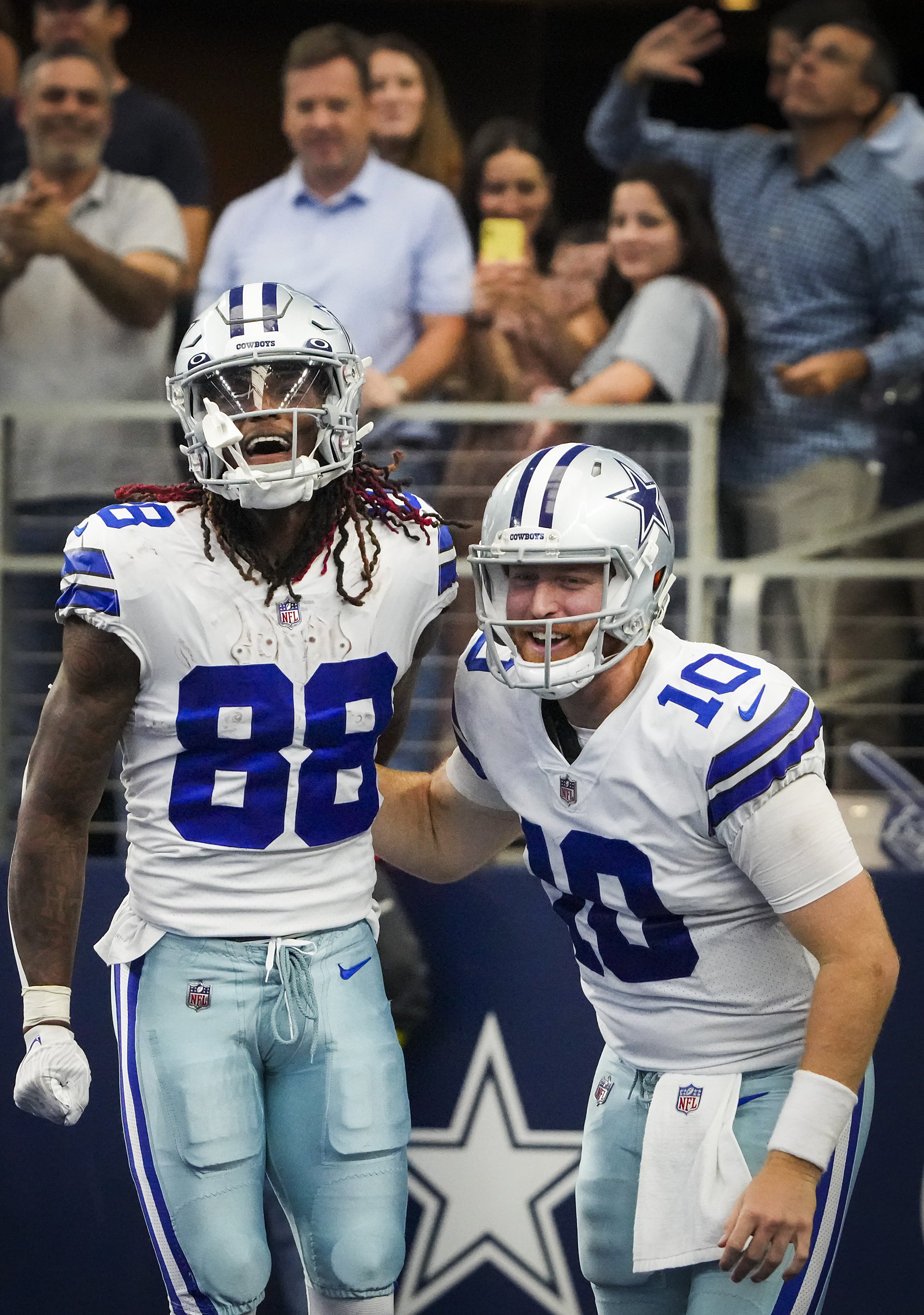 ARLINGTON, TX - OCTOBER 02: Washington Commanders Wide Receiver Jahan  Dotson (1) makes a catch with Dallas Cowboys Cornerback DaRon Bland (26)  defending during the game between the Washington Commanders and Dallas