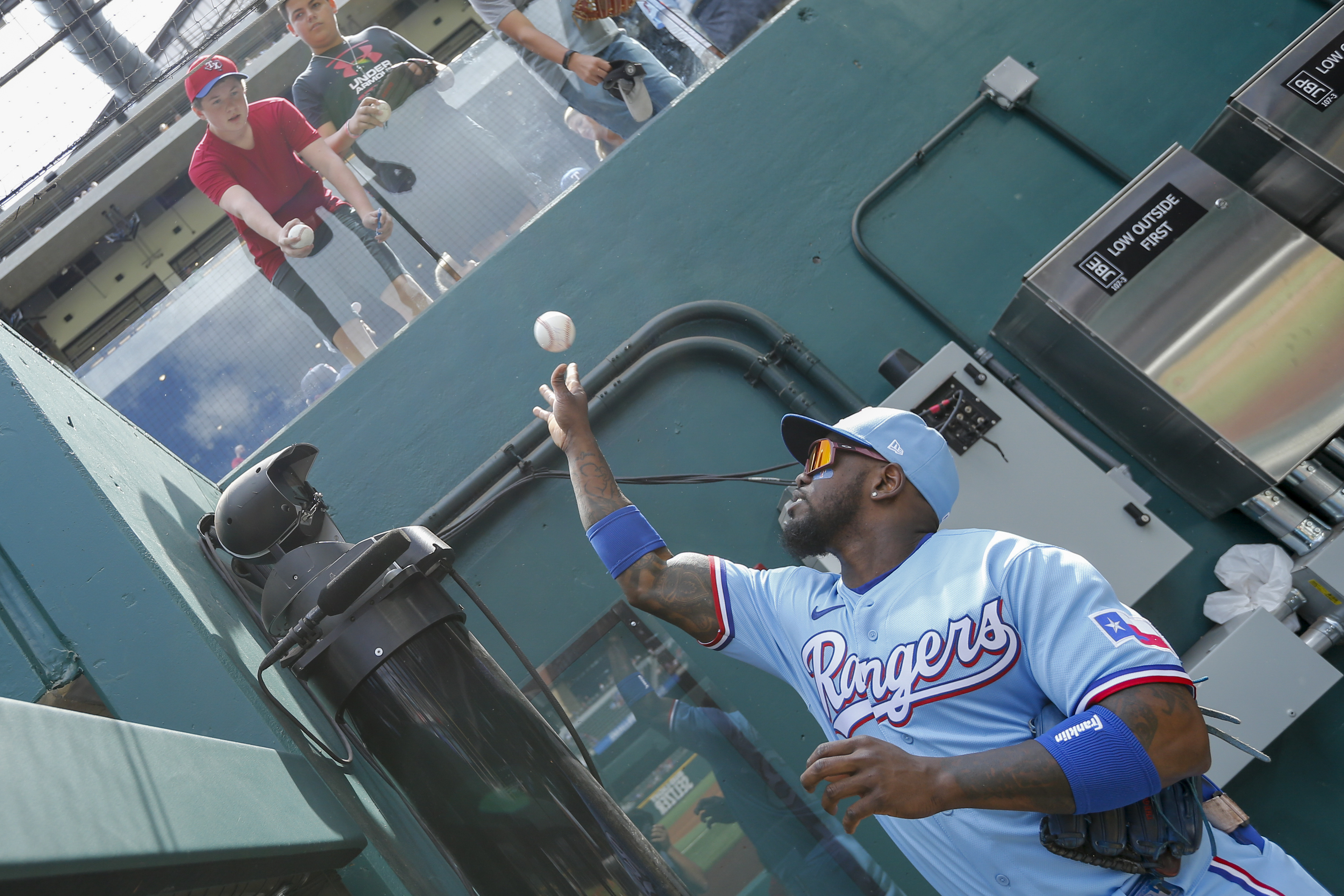 Texas Rangers designated hitter DJ Peters (38) reacts after flying