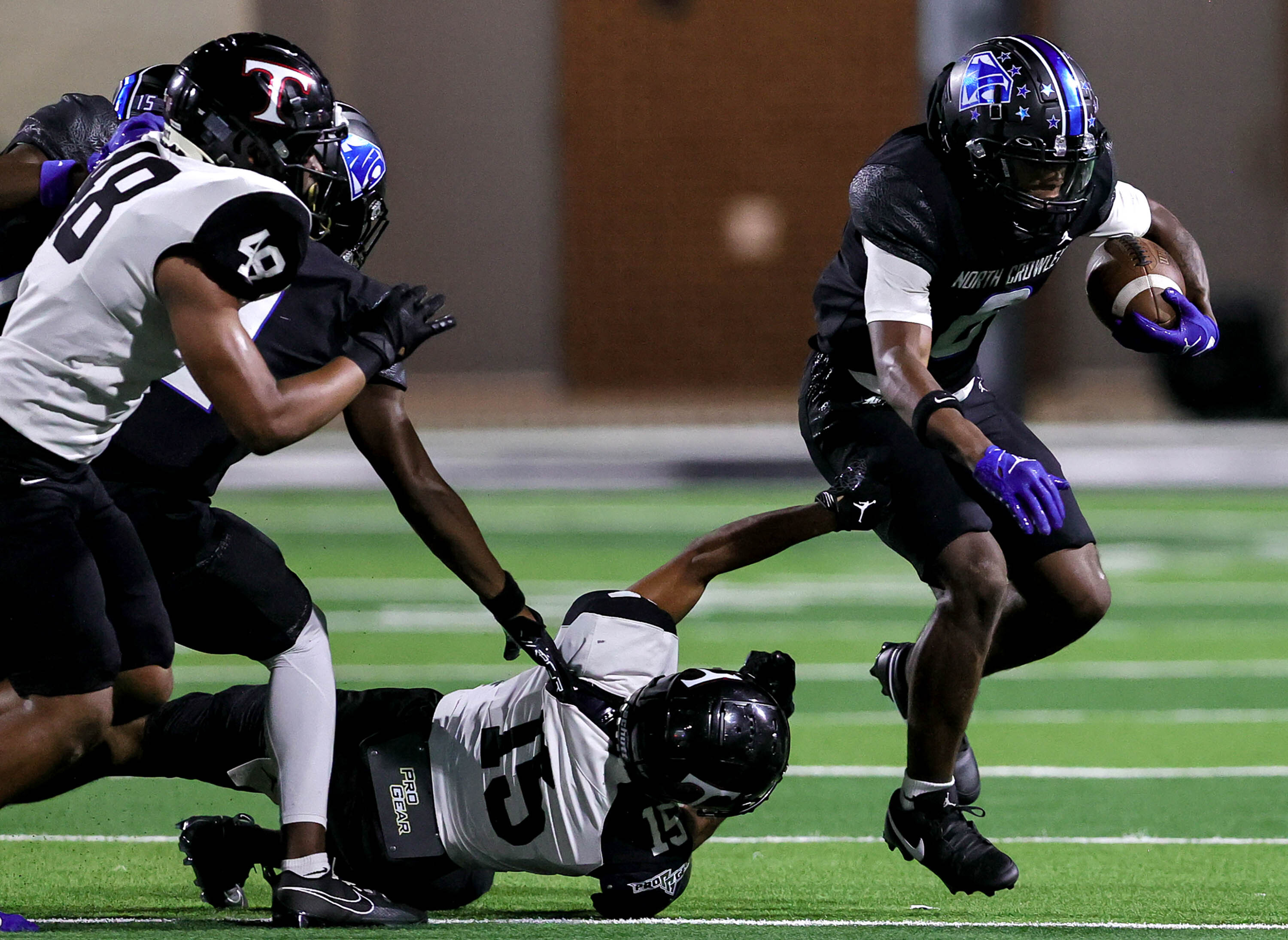 See photos of Euless Trinity's dominant win over Crowley