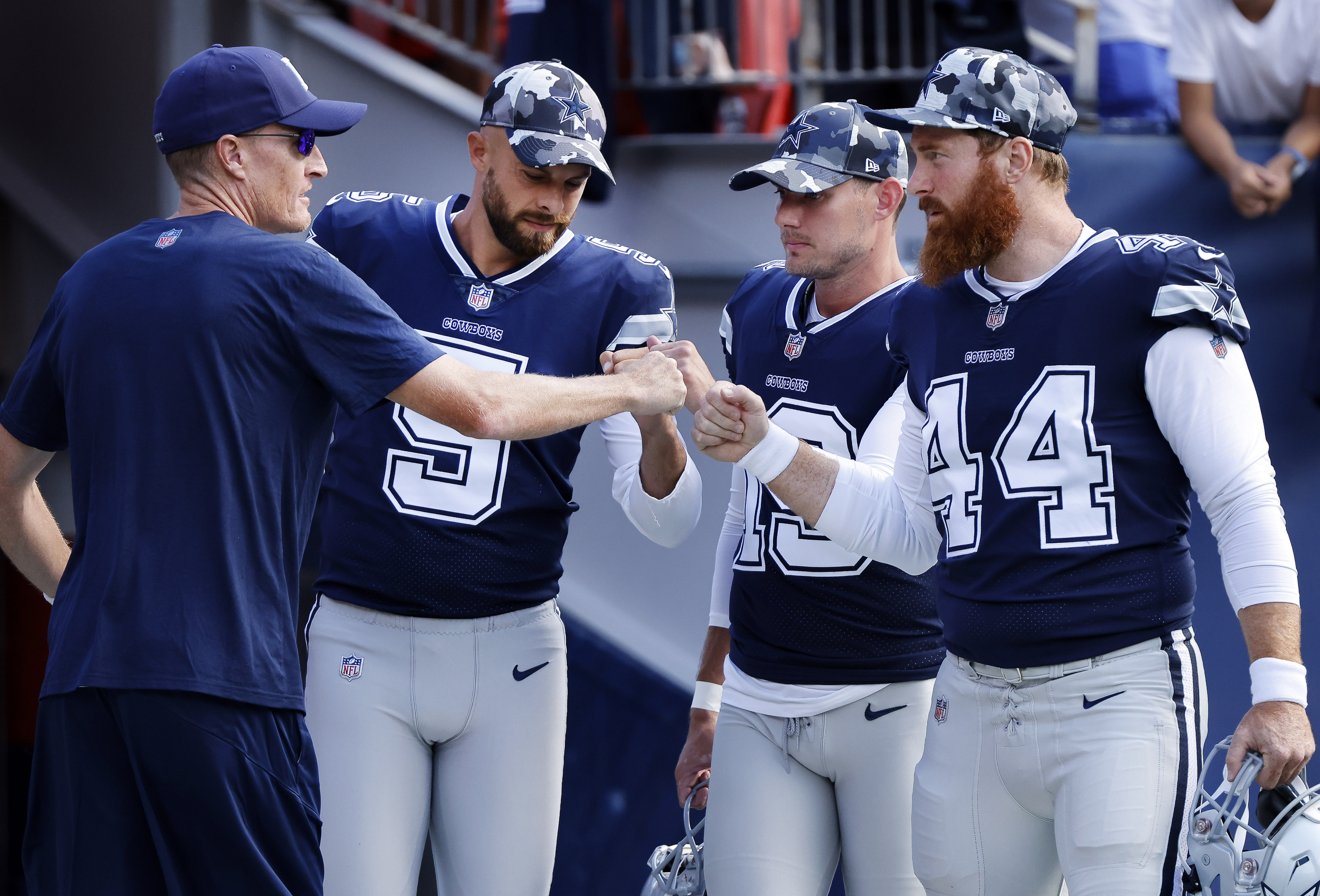 Cowboys try out long snappers after Jake McQuaide's season-ending injury