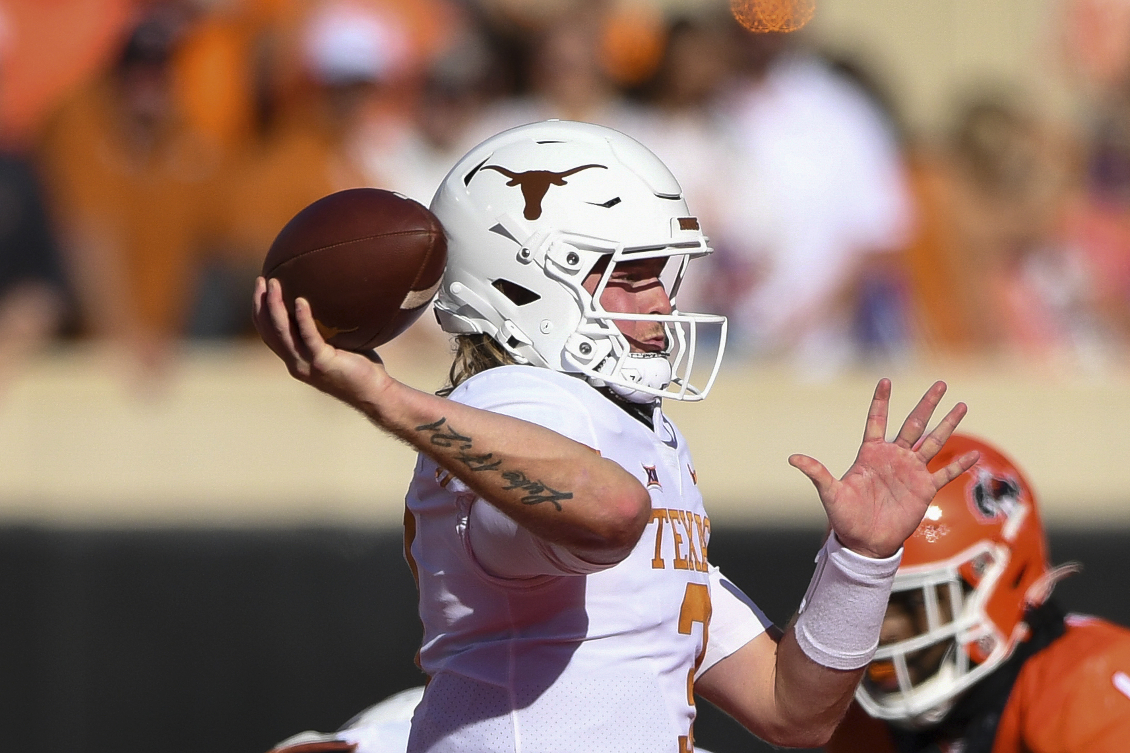 Quinn Ewers comes back to earth with 3-interception performance in Texas'  loss to OK State
