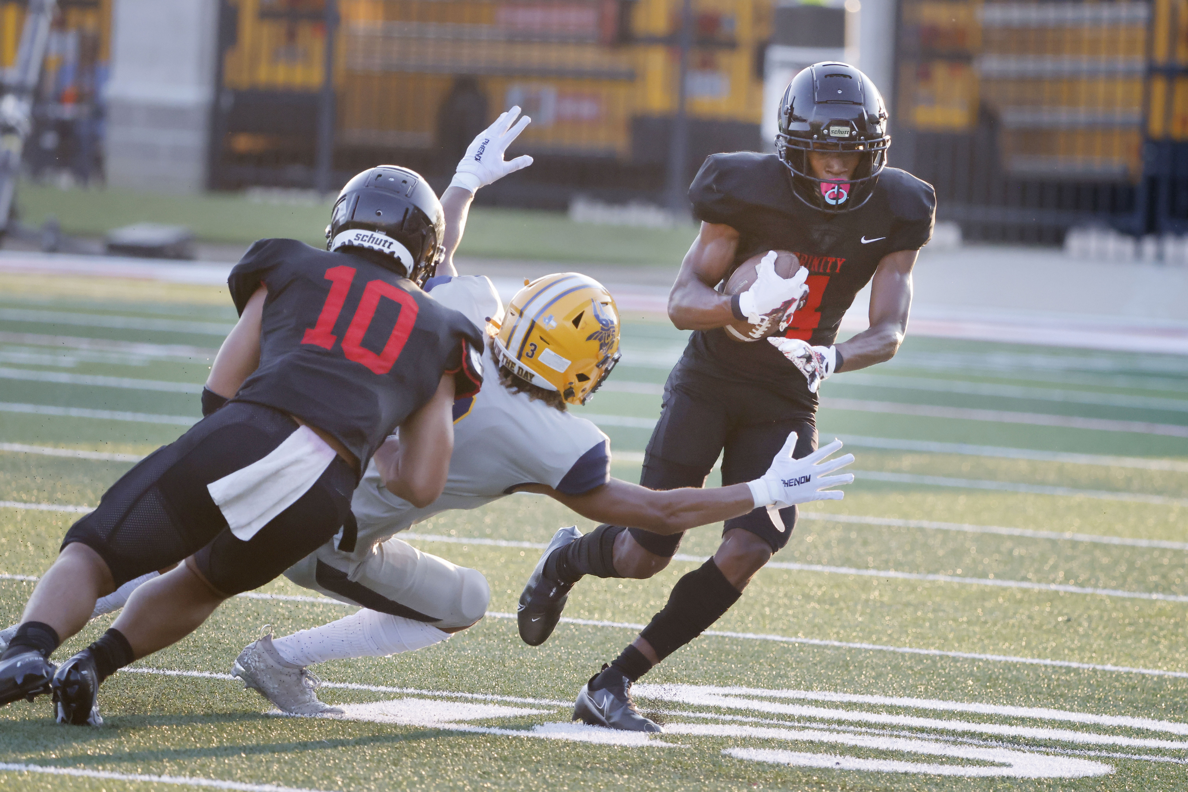 High school football at Globe Life Park: See photos of Euless Trinity's win  over Arlington Lamar