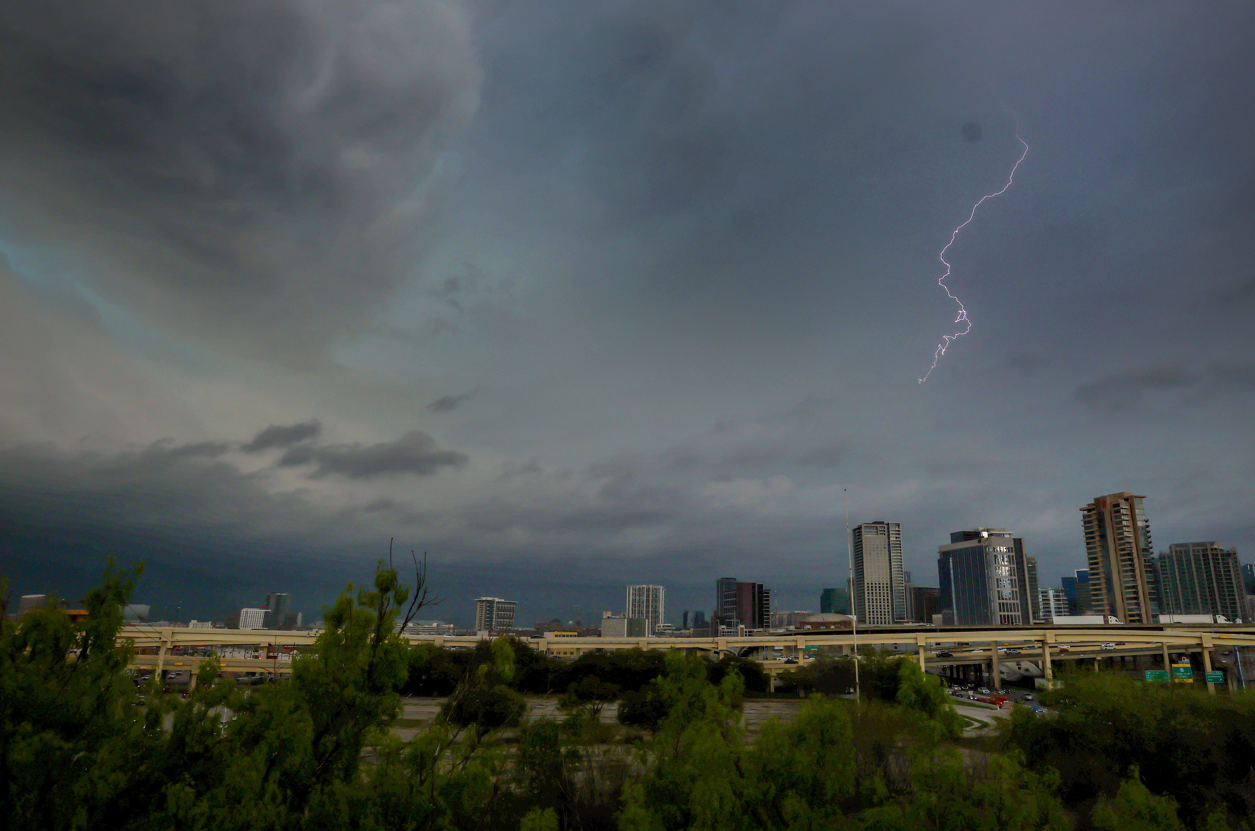 Thunderstorms with strong winds, hail, lightning possible followed