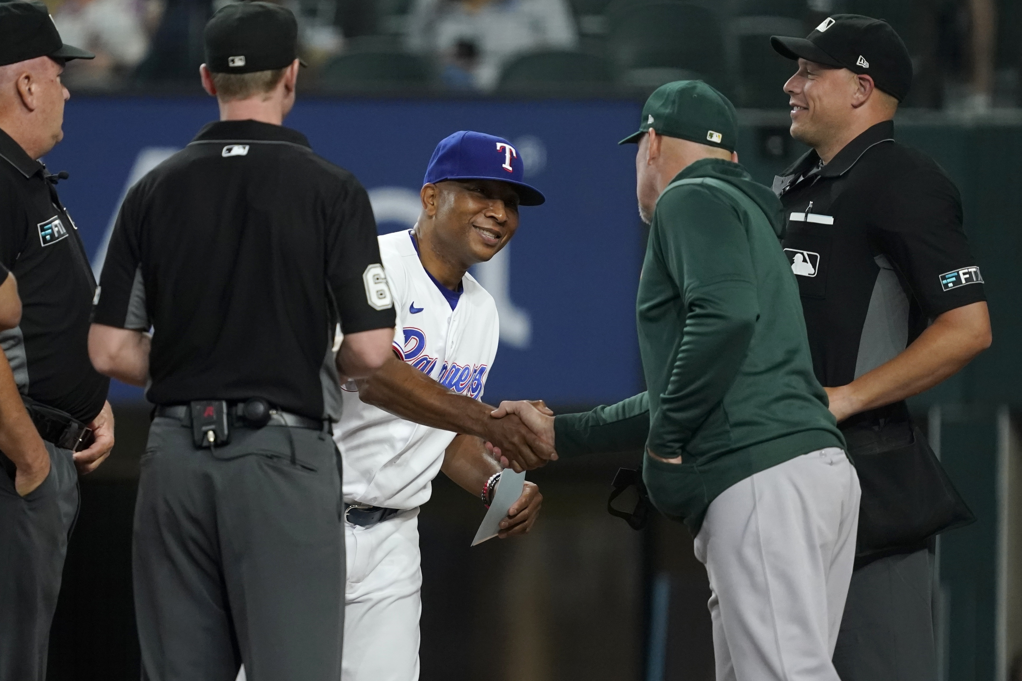 Texas Rangers fire manager Chris Woodward ahead of A's series - Athletics  Nation