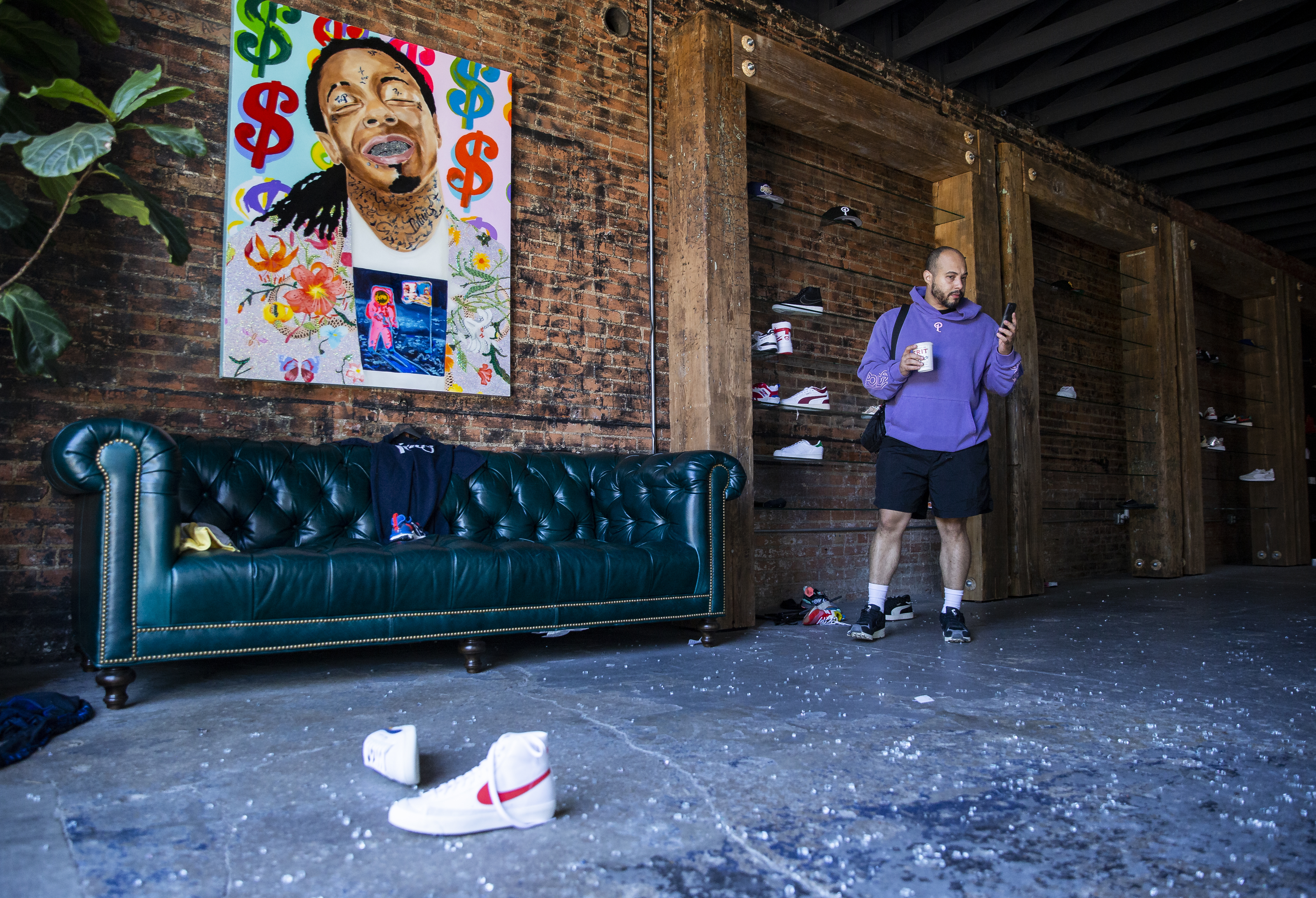 I'm angry and hurt': Deep Ellum shop cleans up after looters smashed window  and grabbed sneakers
