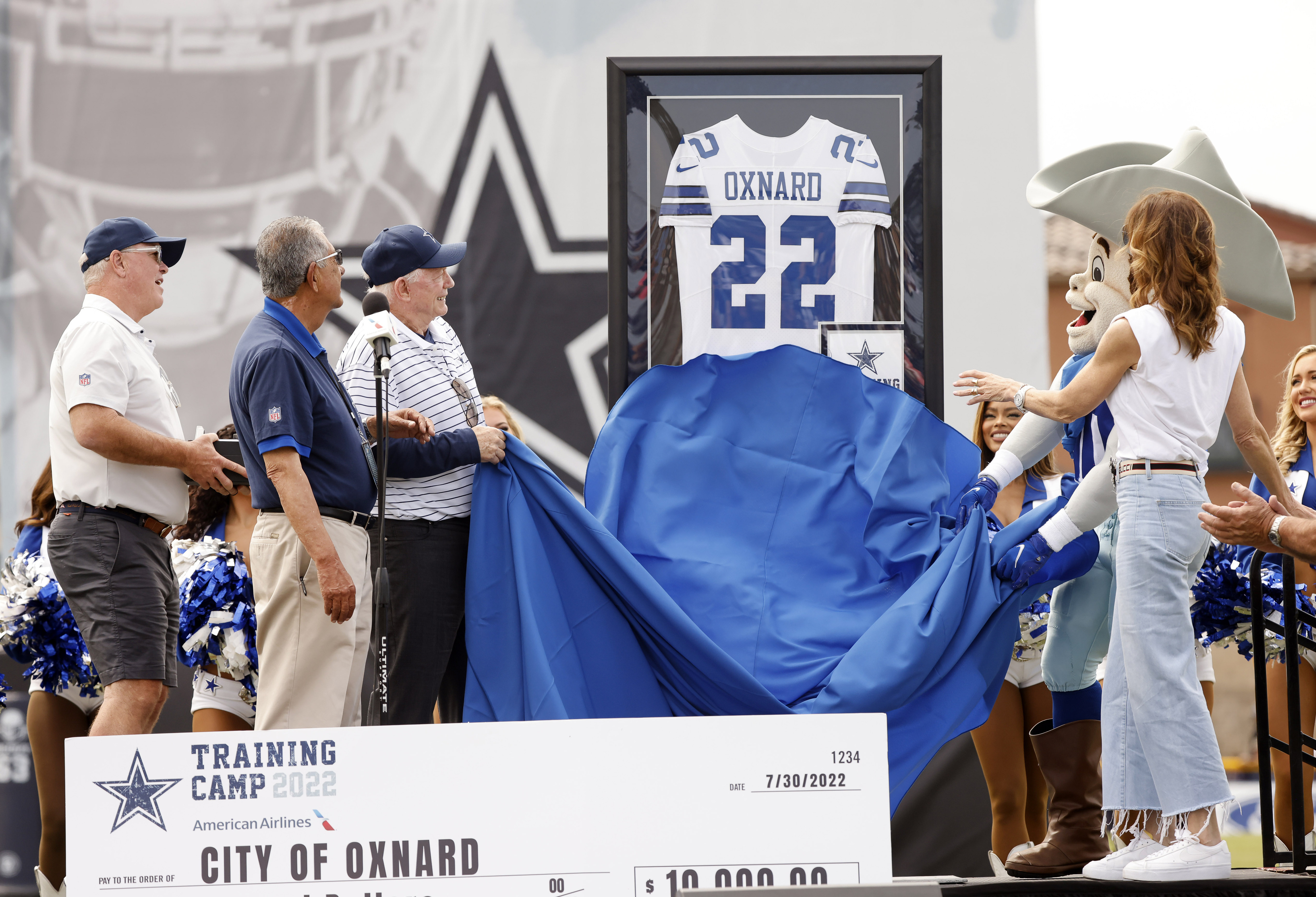 Photos: Kick back and celebrate! Dallas Cowboys Cheerleaders perform at  training camp opening ceremonies