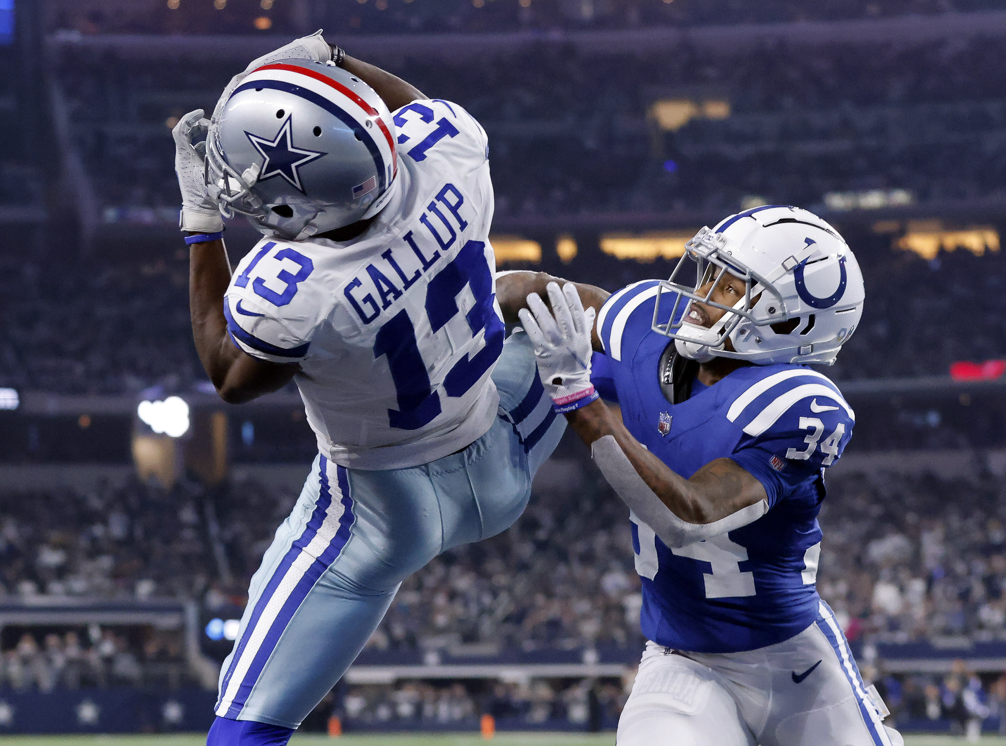 Dallas Cowboys safety Malik Hooker intercepts a Indianapolis Colts