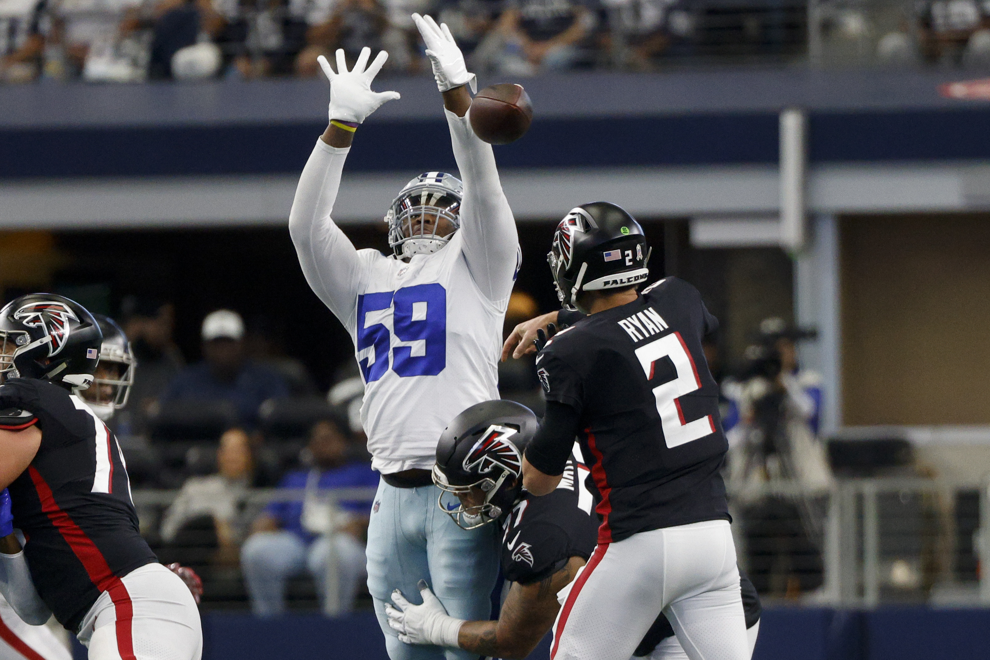 Dallas Cowboys defensive end Chauncey Golston walks off the field after an  NFL football game against the Detroit Lions in Arlington, Texas, Sunday, Oct.  23, 2022. (AP Photo/Tony Gutierrez Stock Photo - Alamy