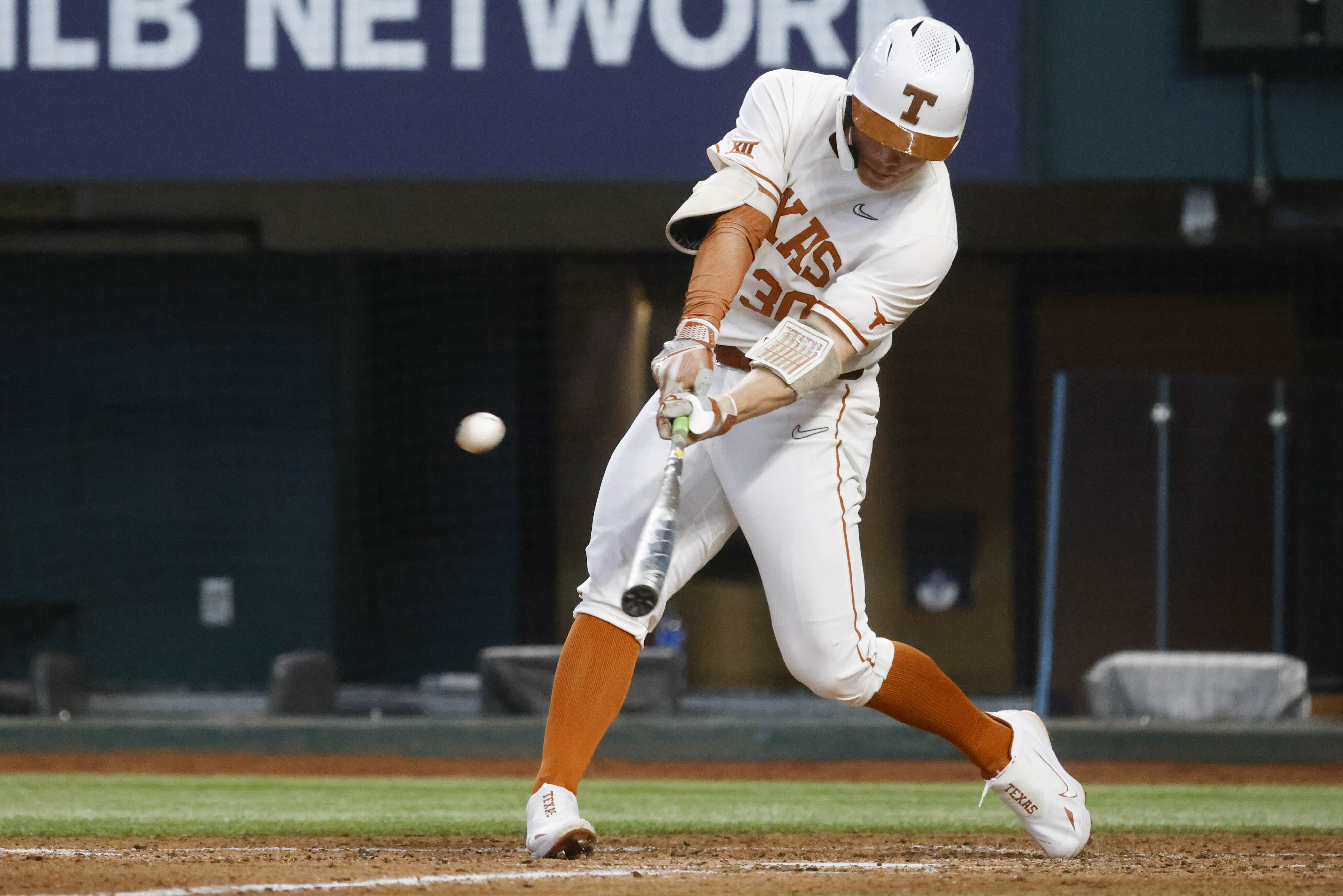 Photos: Texas Opens Big 12 Tournament Against Kansas