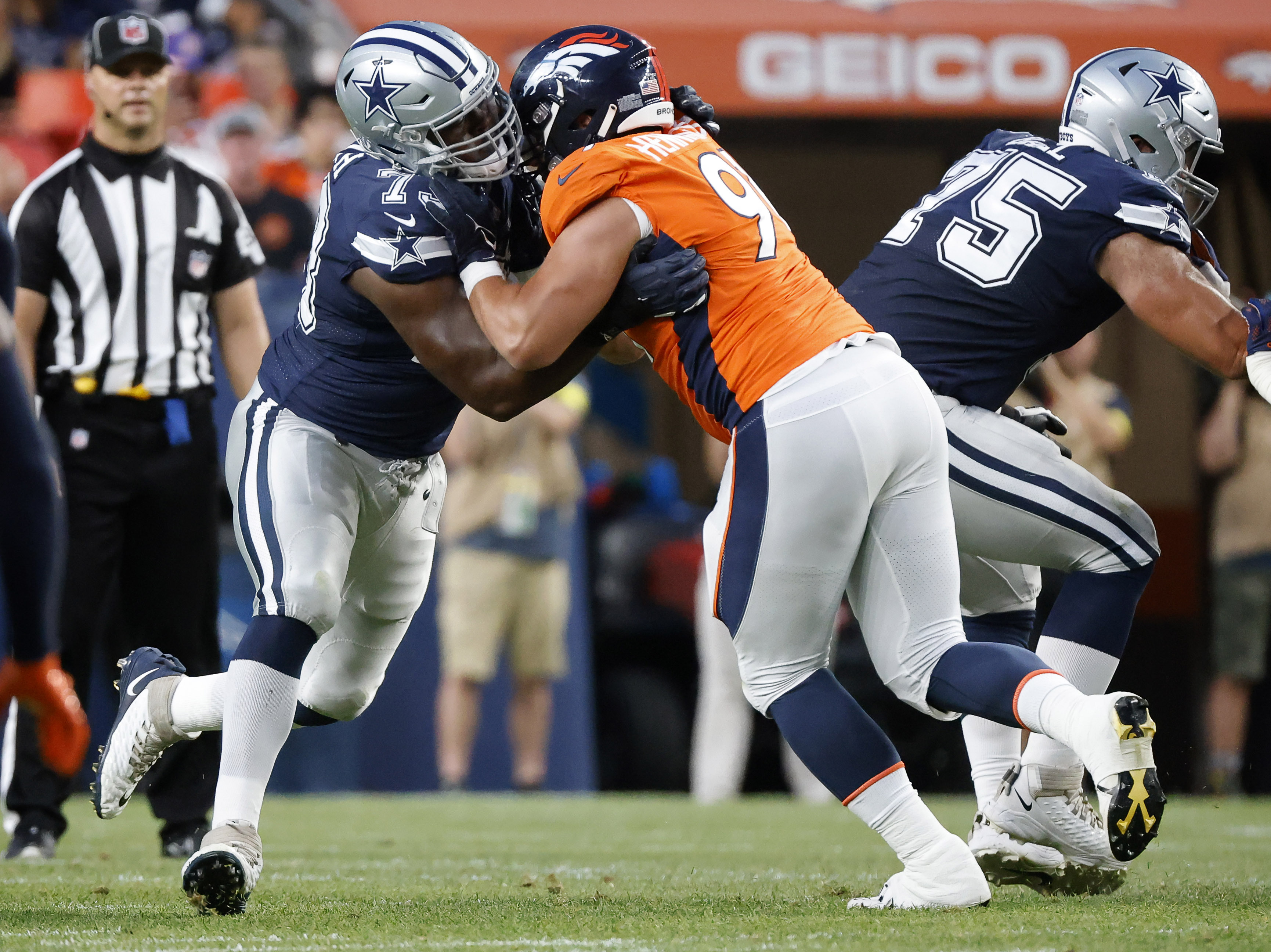 Cowboys lose preseason opener in Denver