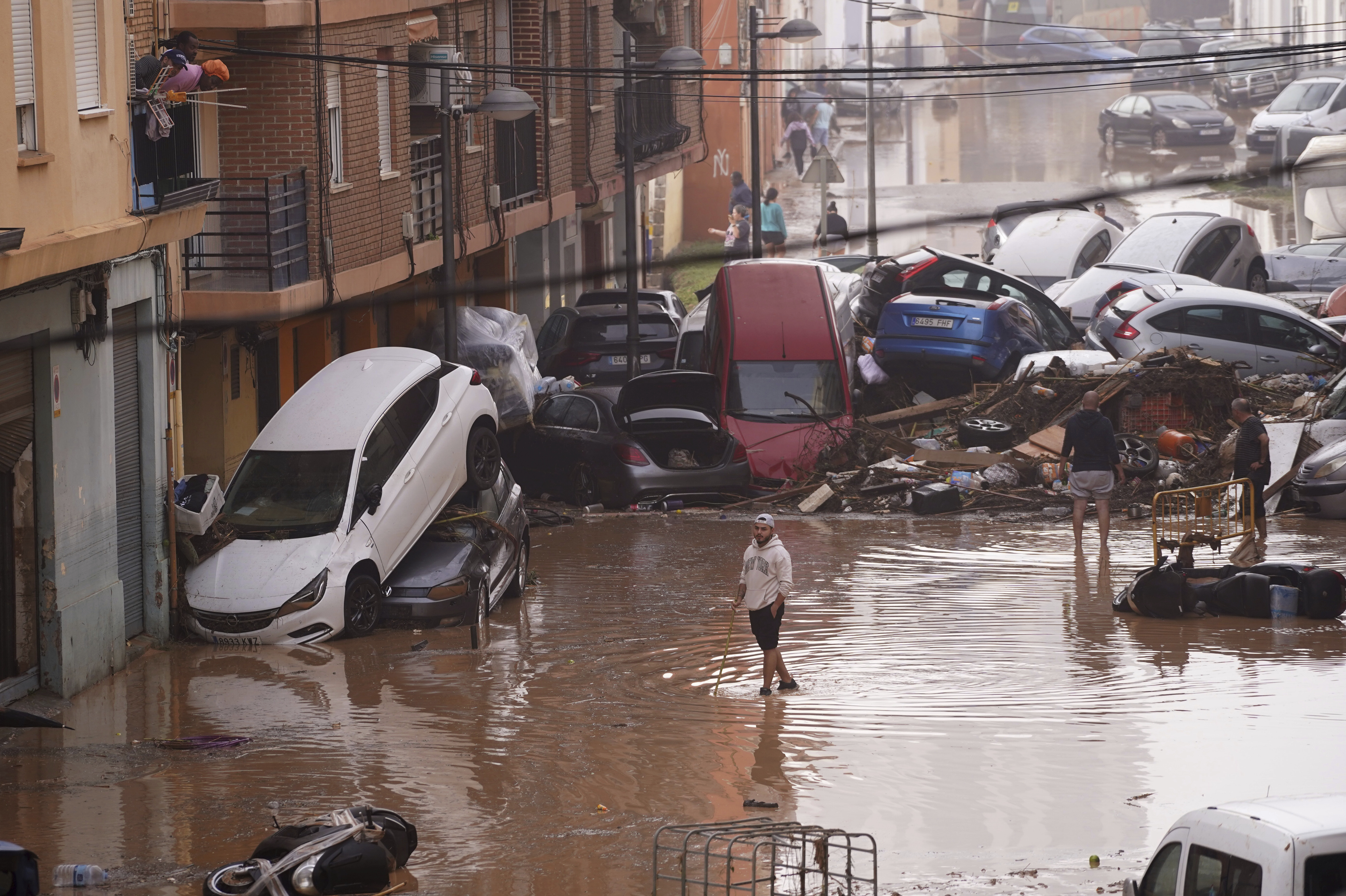Devastating flash floods in eastern Spain kill at least 95 people,  officials say