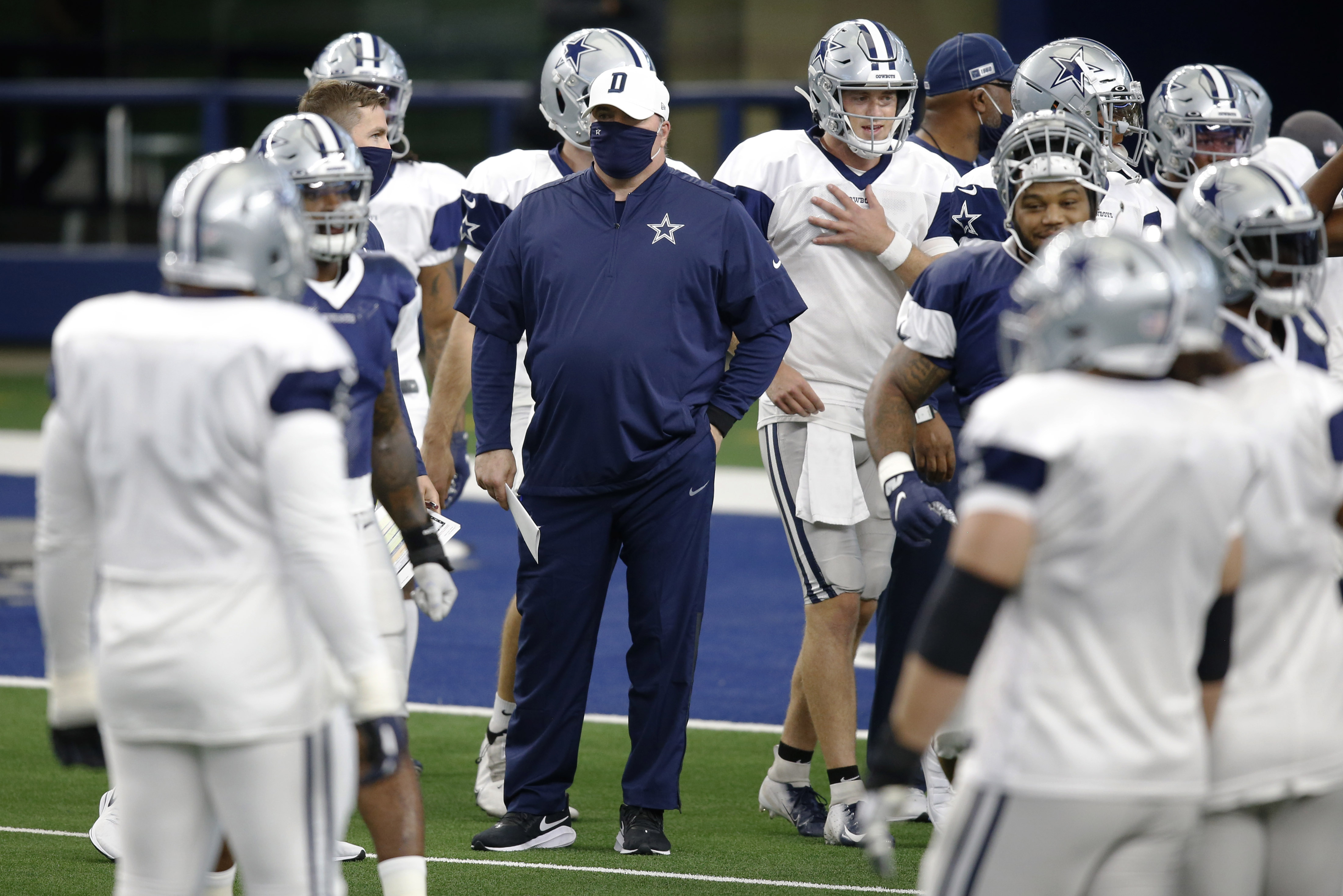 Dallas Cowboys players wear no names on uniforms during scrimmage