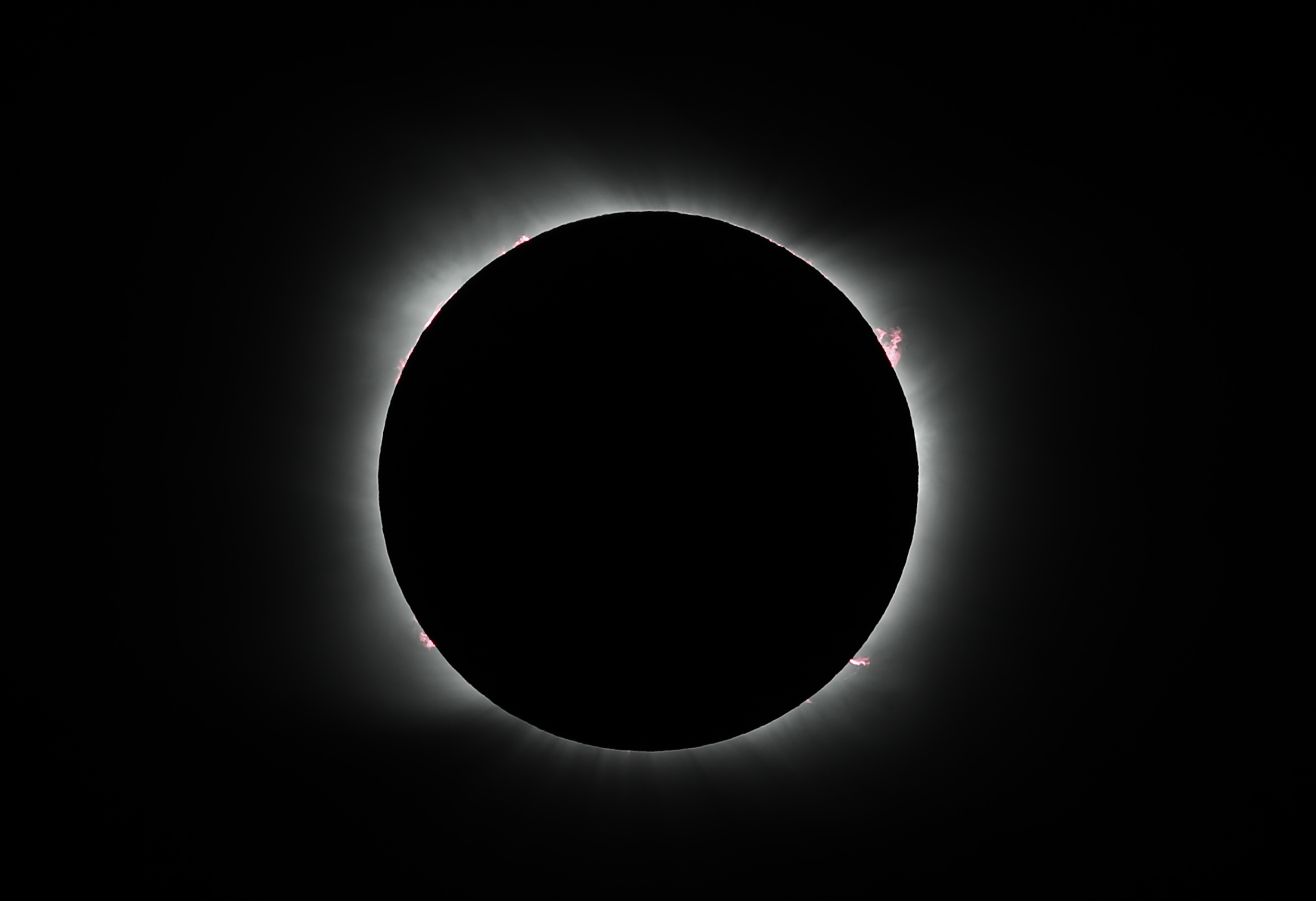 FILE - The moon covers the sun during a solar eclipse in Piedra del Aguila, Argentina,...