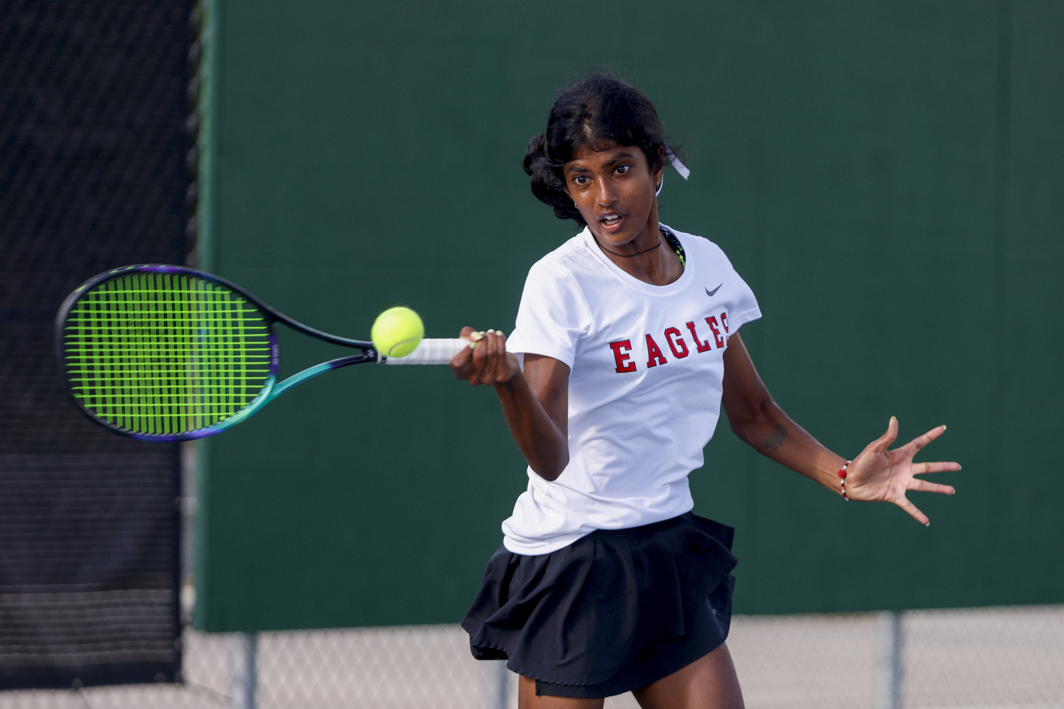 Argyle’s Meghna Arun Kumar  hits the ball during the 4A girls singles championship match at...
