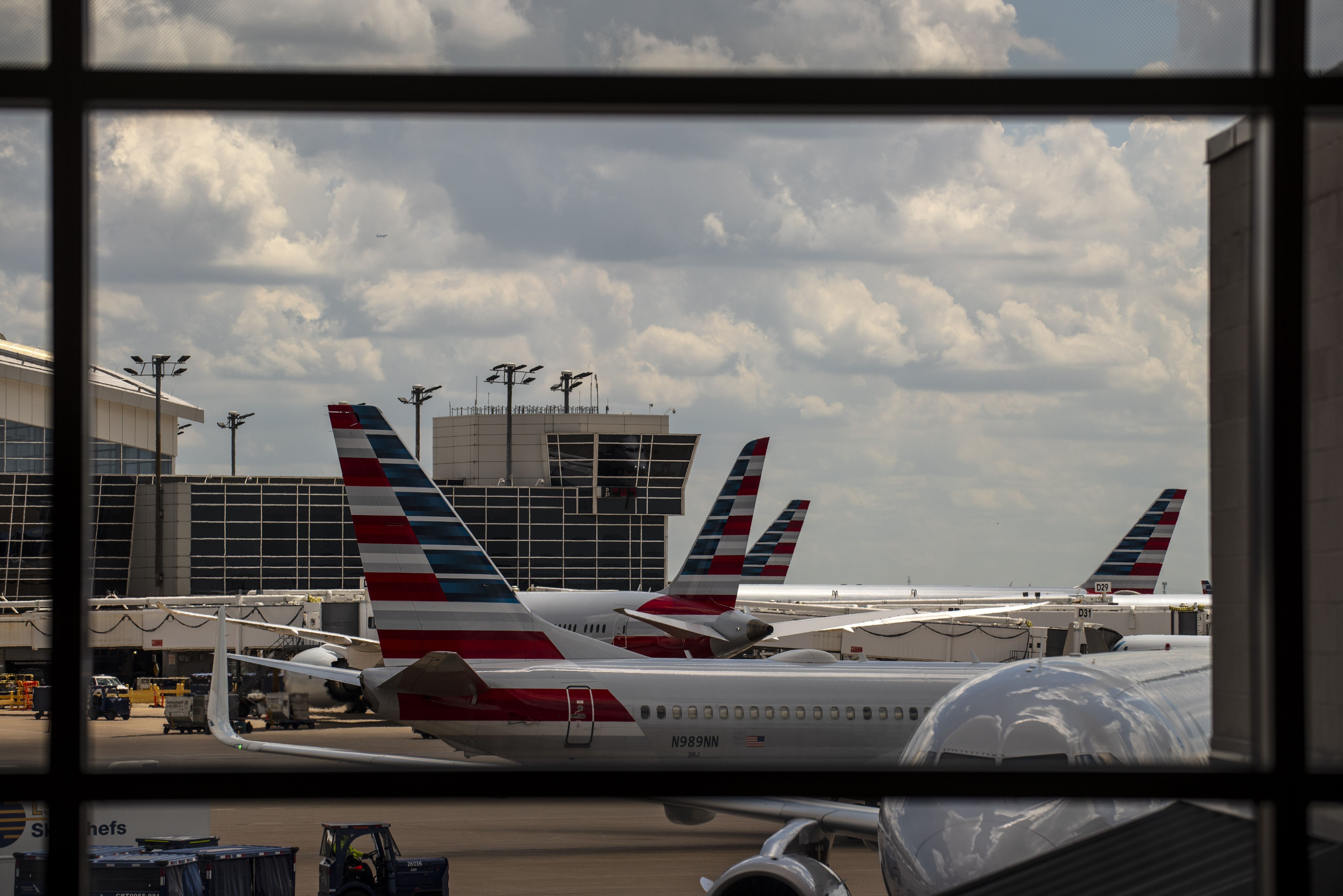 Dia American Airlines Terminal Storms Force American Airlines, Other Carriers To Cancel 1,400-Plus Flights  Thursday