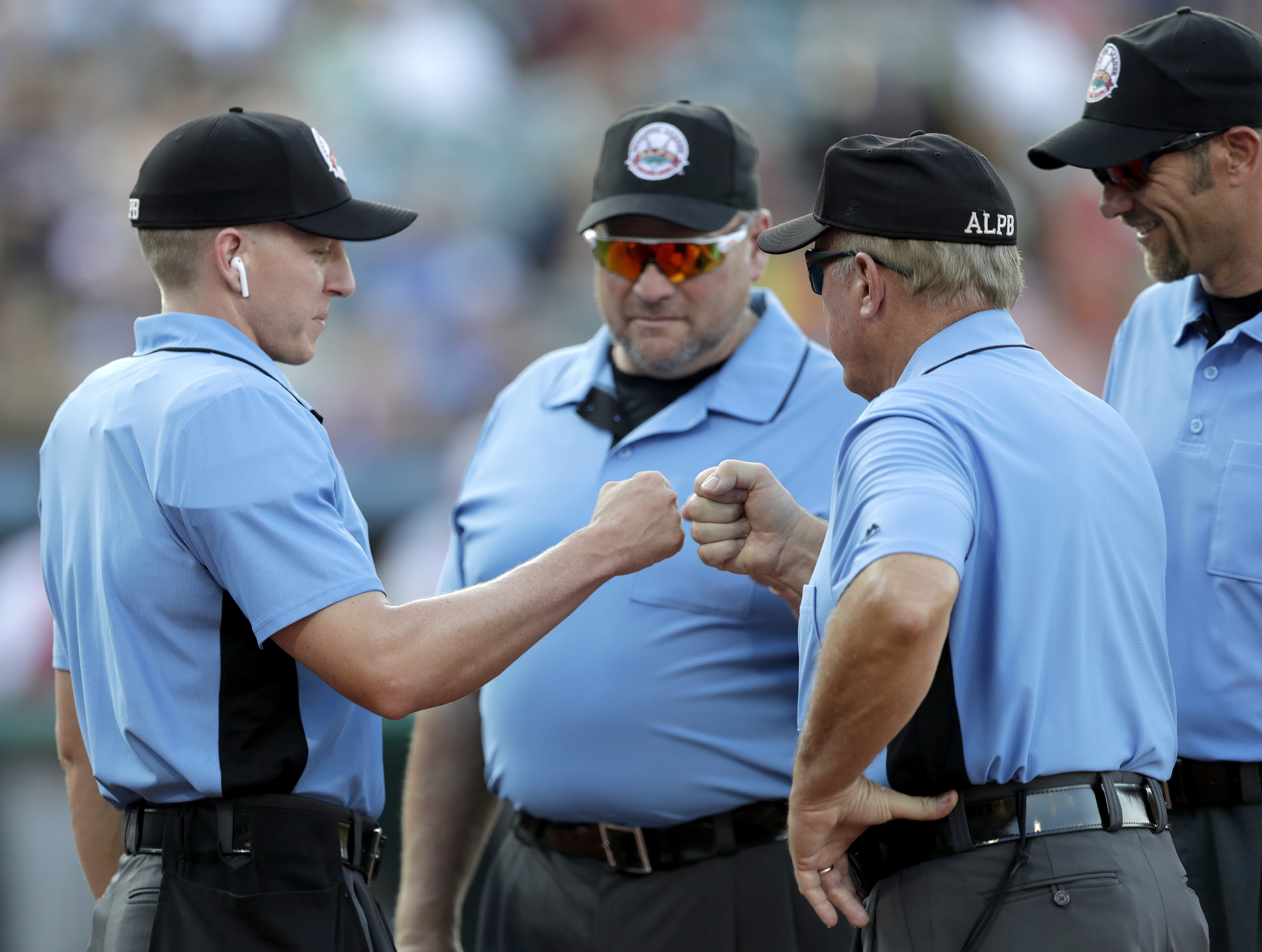 Proposed baseball rules: no mascots, bat boys, high-fives or spitting