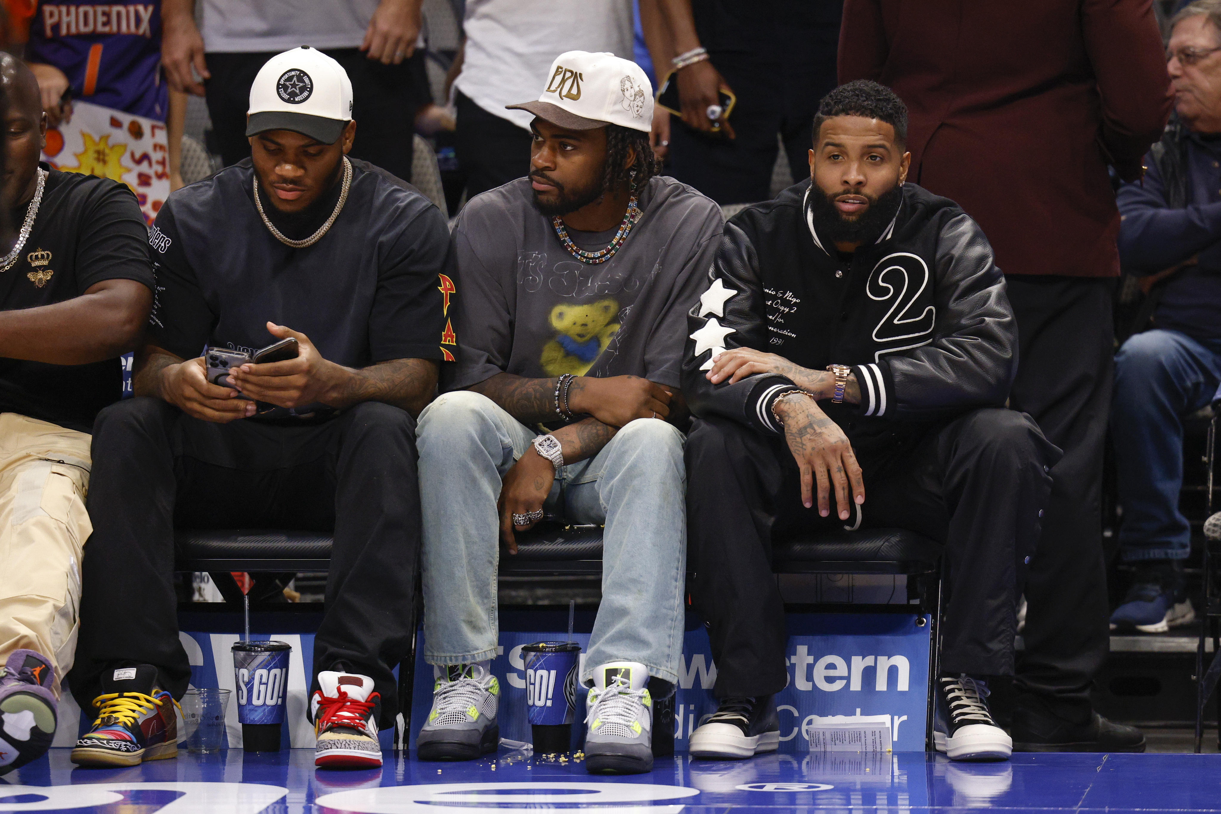 OBJ is at the Mavs game with Micah Parsons and Trevon Diggs 