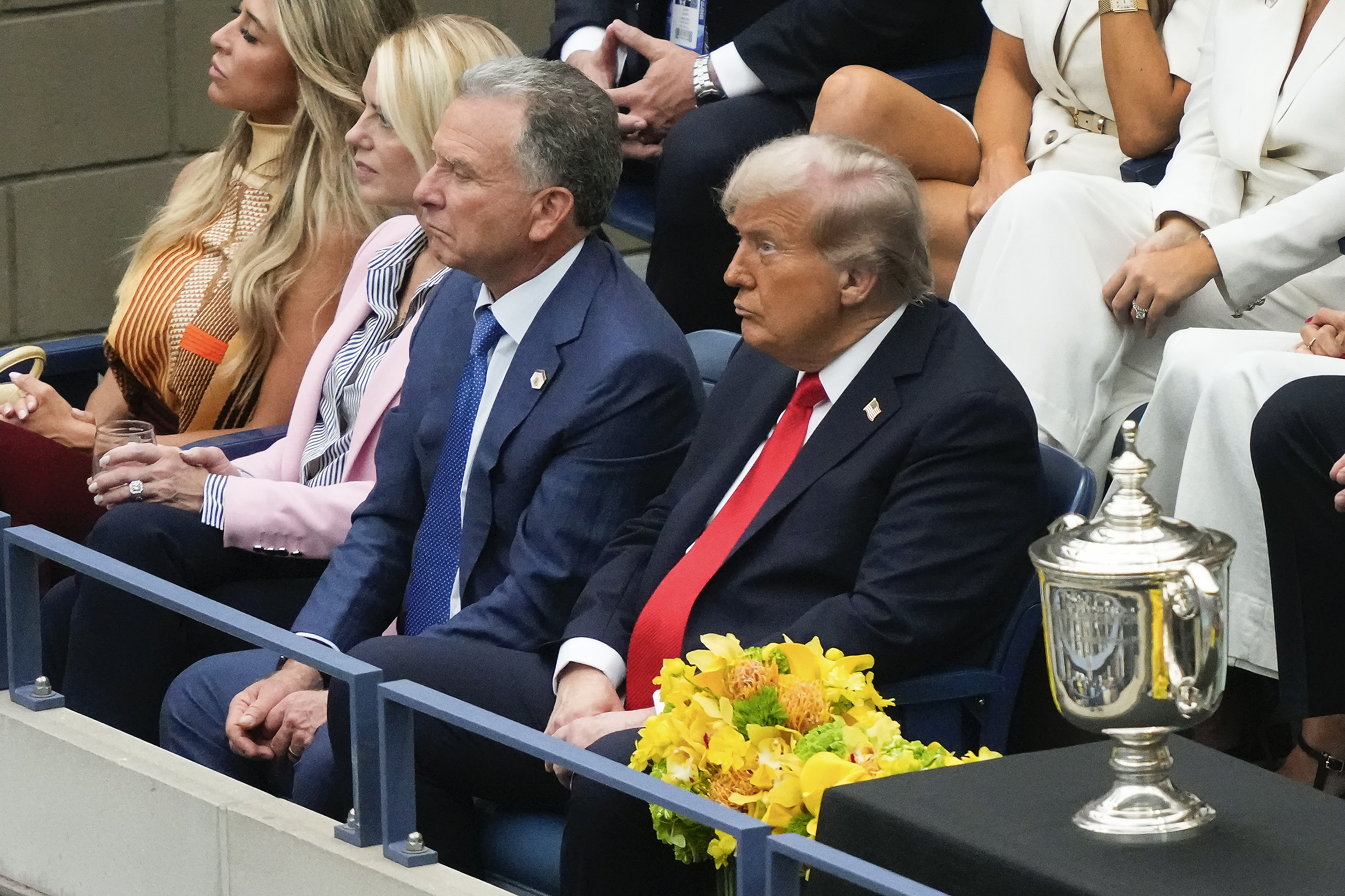 To cheers and boos, Trump attends U.S. Open as Rolex's guest despite Swiss tariffs