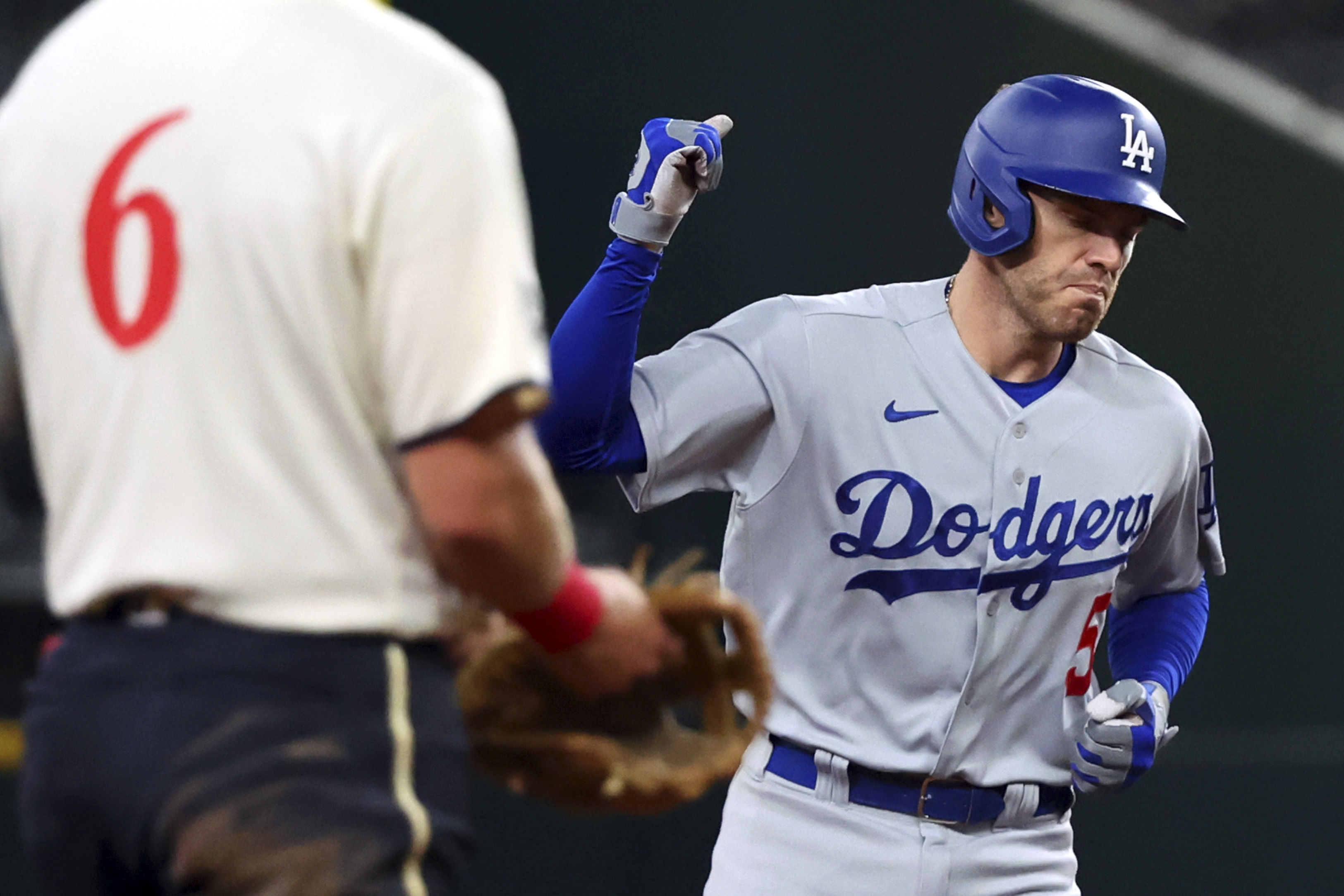 Rangers pitching falls victim to stacked Dodgers lineup, drops series opener vs
