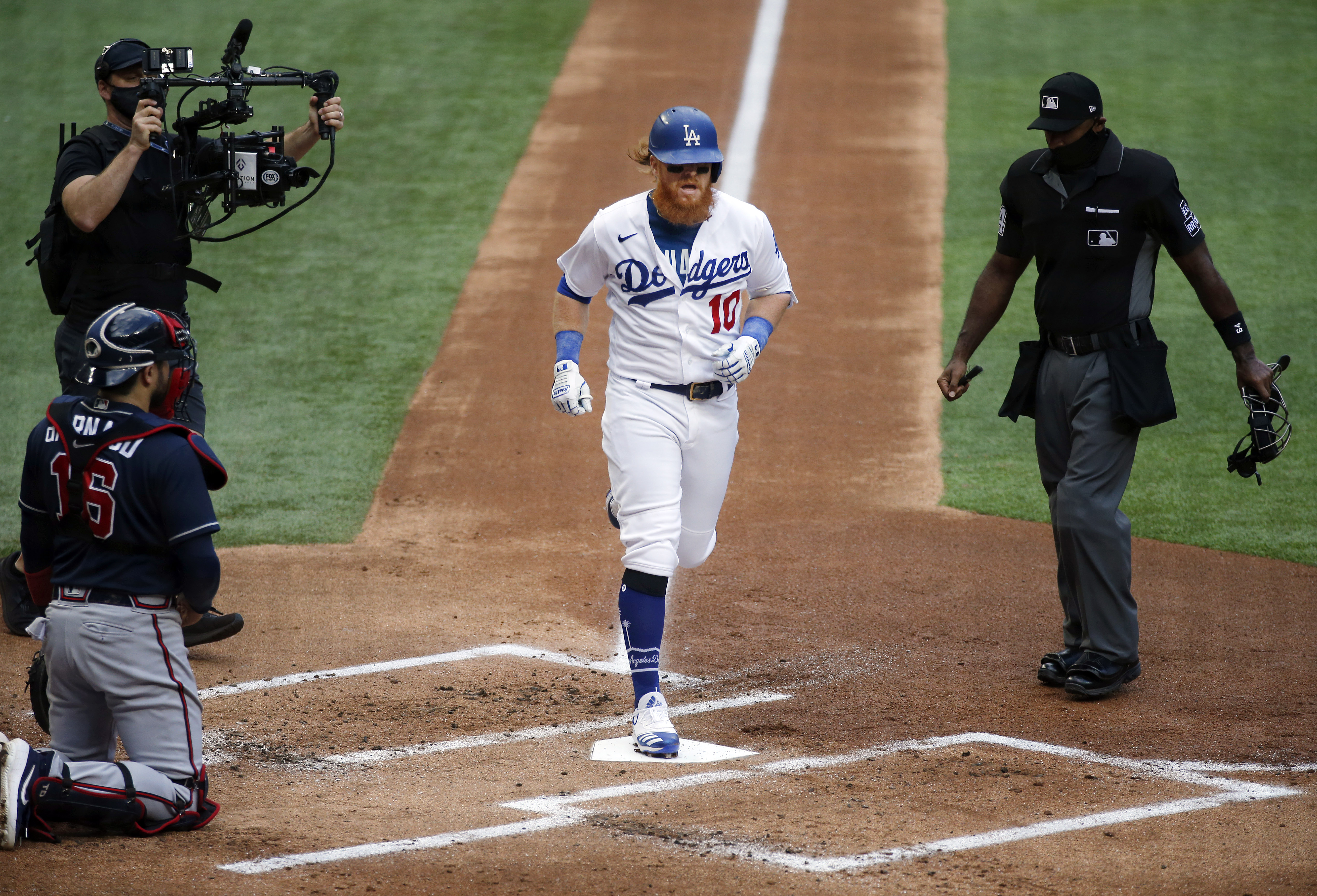 Photos: Pair of HRs, Mookie Betts' clutch catch push Dodgers-Braves to Game  7