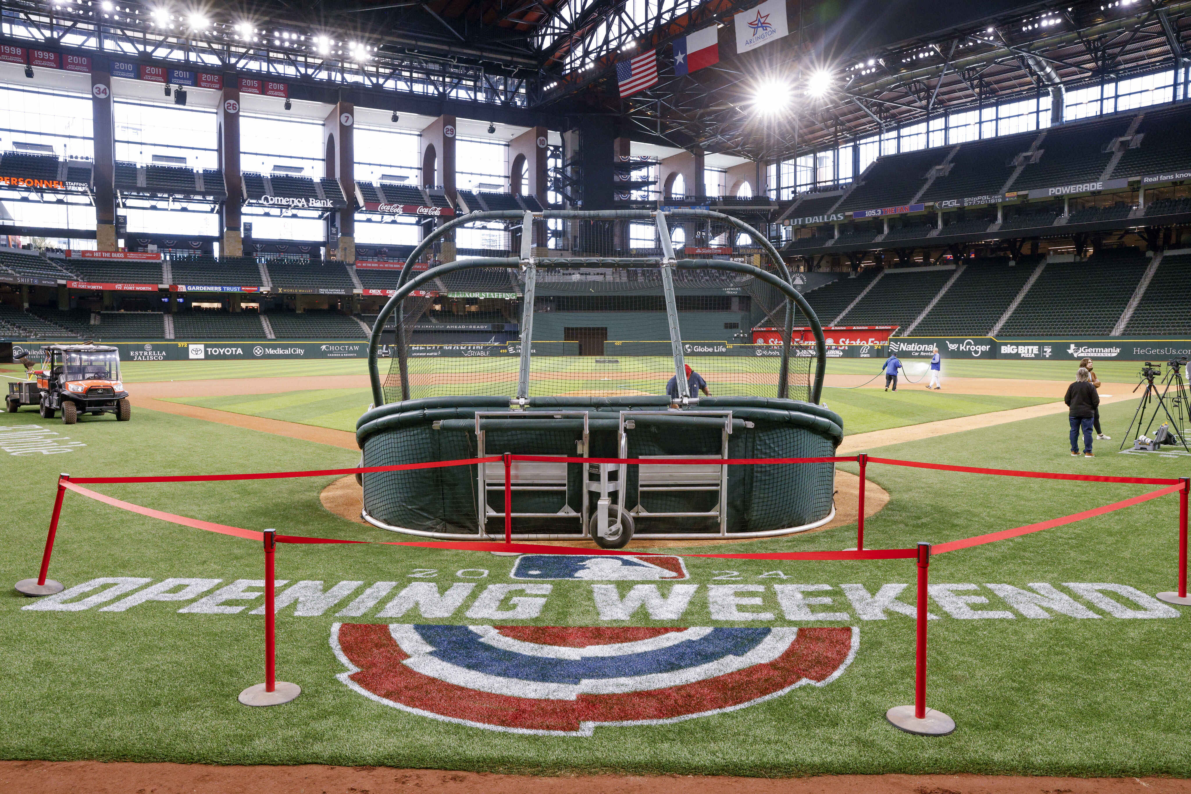 Who is throwing out the first pitch at Texas Rangers opening day?