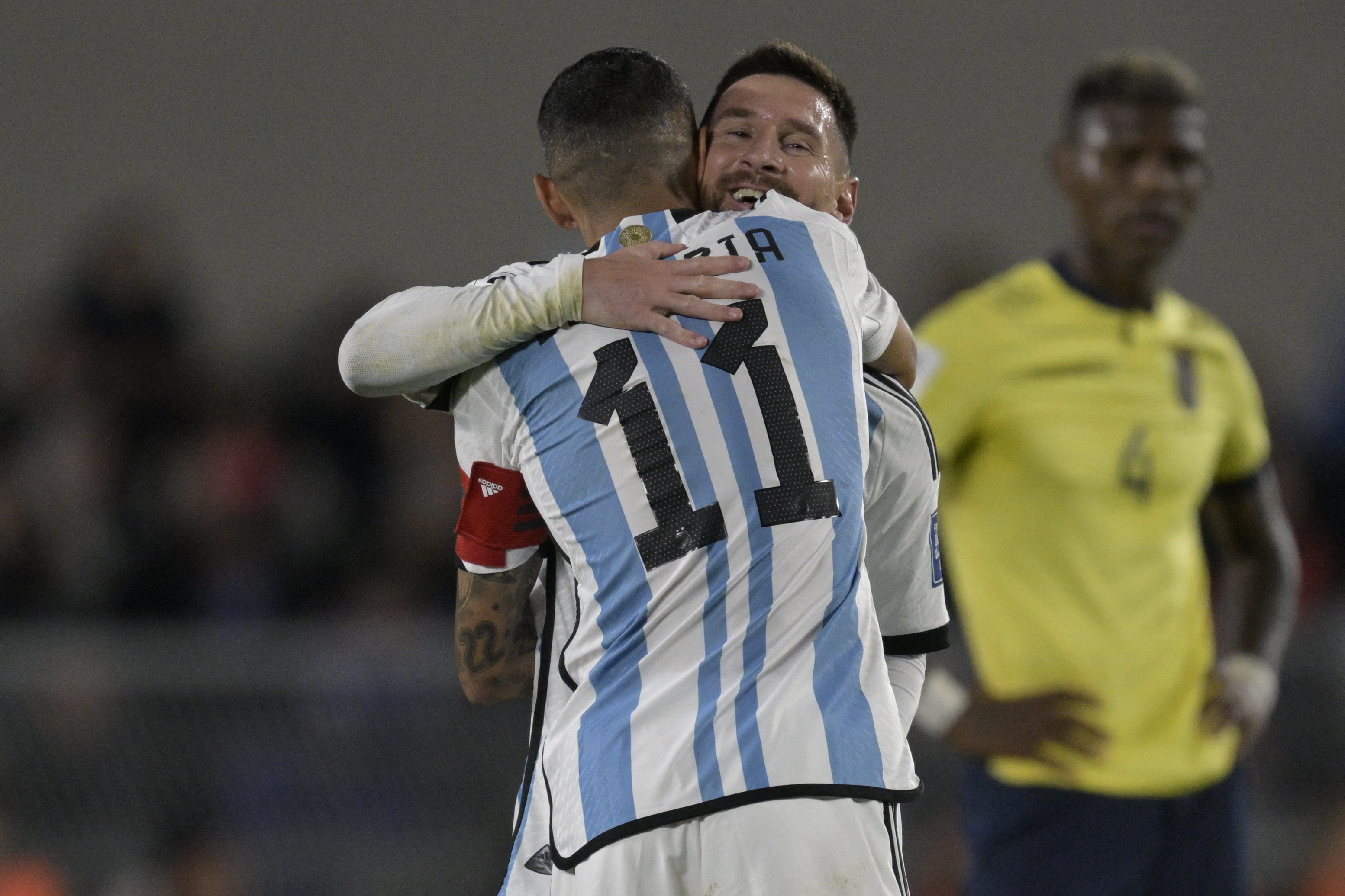 (FILES) Argentina's forward Lionel Messi (R) gives the captain's armband to teammate Angel Di Maria as he is substituted during the 2026 FIFA World Cup South American qualifiers football match between Argentina and Ecuador, at the Mas Monumental stadium in Buenos Aires, on September 7, 2023.