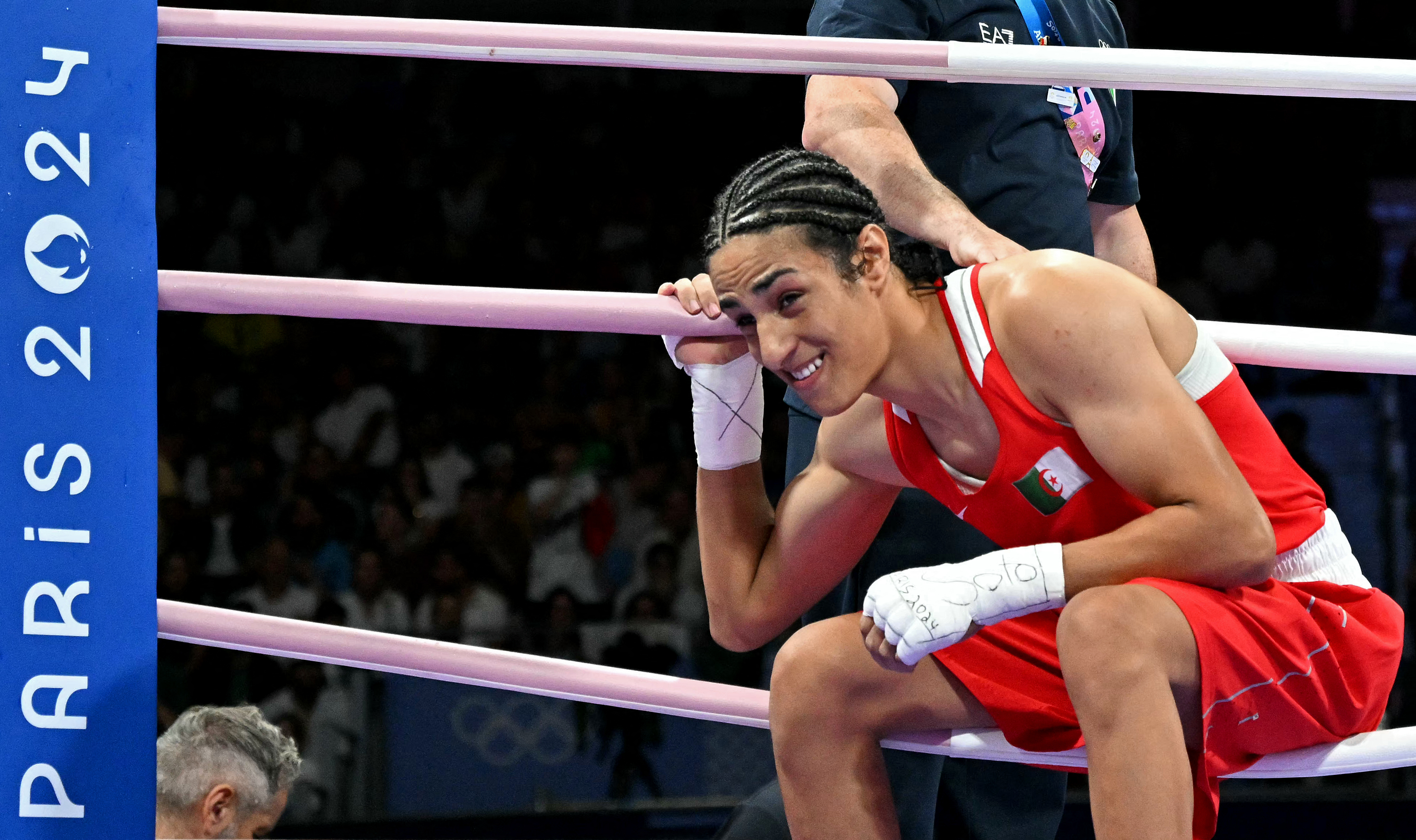 Algeria's Imane Khelif leaves after her women's 66kg preliminaries round of 16 boxing match against Italy's Angela Carini during the Paris 2024 Olympic Games at the North Paris Arena, in Villepinte on August 1, 2024.
