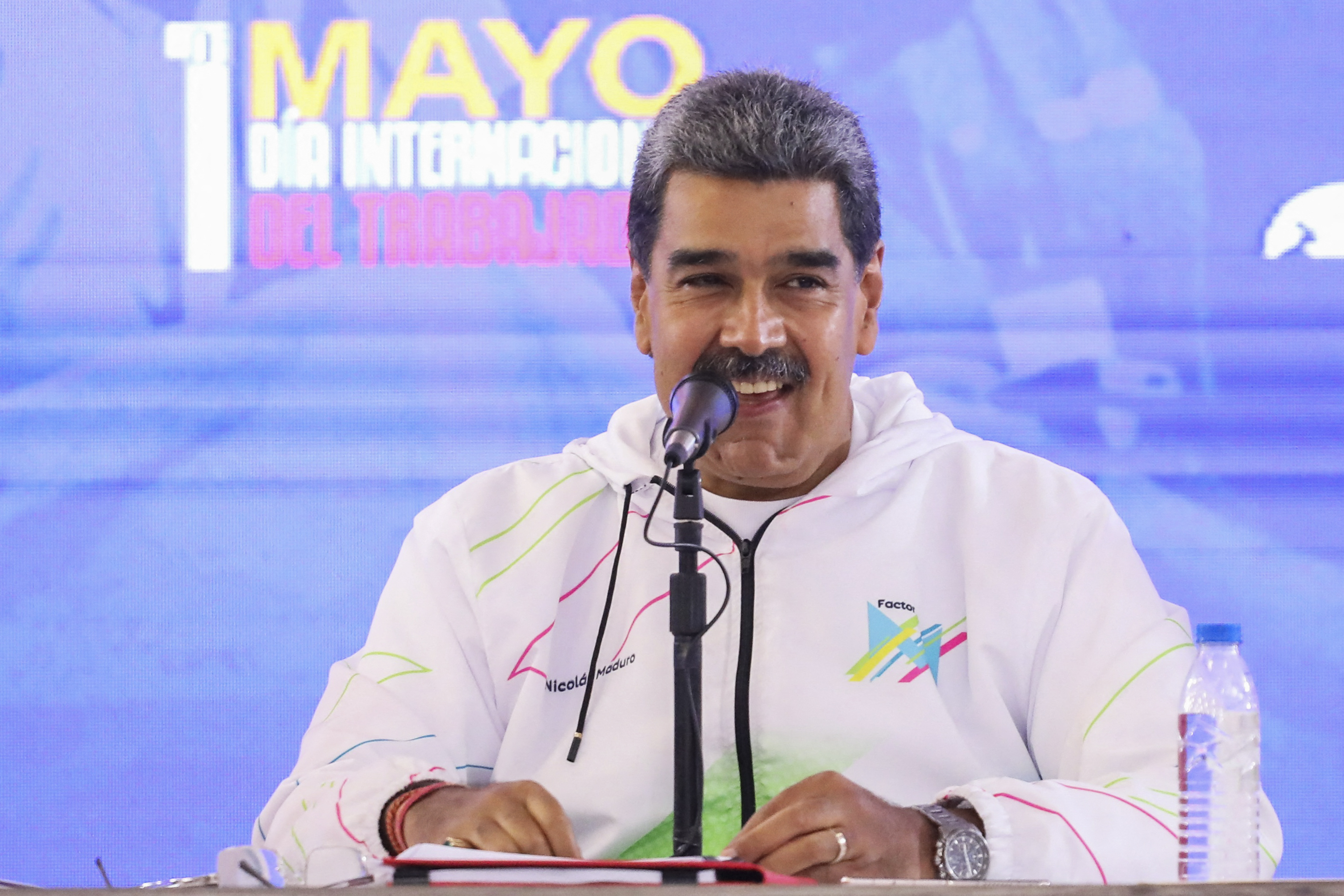 This handout picture released by the Venezulan Presidency shows Venezuela's President Nicolas Maduro speaking during an event to commemorate May Day (Labour Day) in Caracas on May 1, 2024. (Photo by ZURIMAR CAMPOS / Venezuelan Presidency / AFP) / RESTRICTED TO EDITORIAL USE - MANDATORY CREDIT "AFP PHOTO / VENEZUELAN PRESIDENCY / ZURIMAR CAMPOS" - NO MARKETING NO ADVERTISING CAMPAIGNS - DISTRIBUTED AS A SERVICE TO CLIENTS