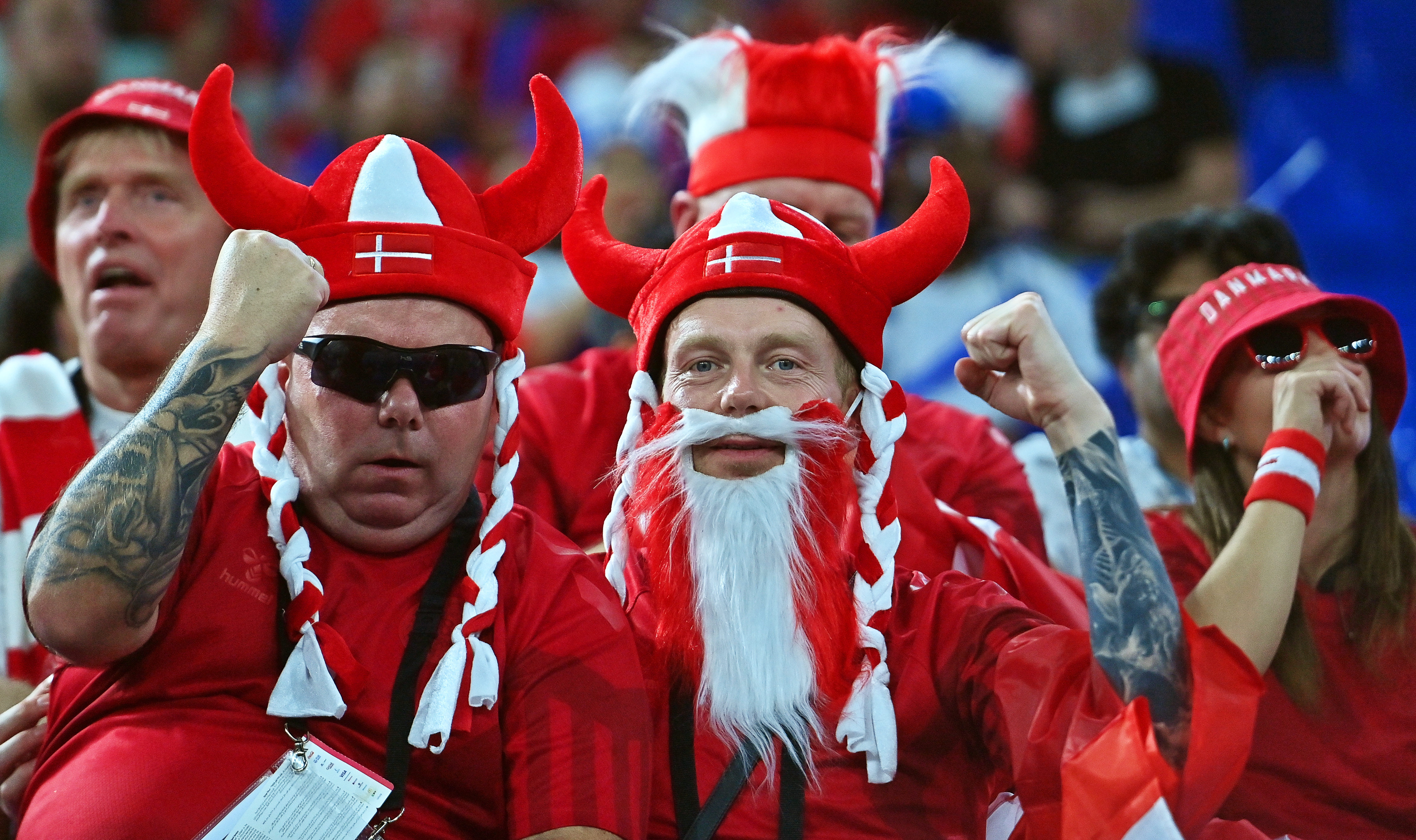 Doha (Qatar), 26/11/2022.- Fans of Denmark cheer prior to the FIFA World Cup 2022 group D soccer match between France and Denmark at Stadium 947 in Doha, Qatar, 26 November 2022. (Mundial de Fútbol, Dinamarca, Francia, Catar) EFE/EPA/Noushad Thekkayil