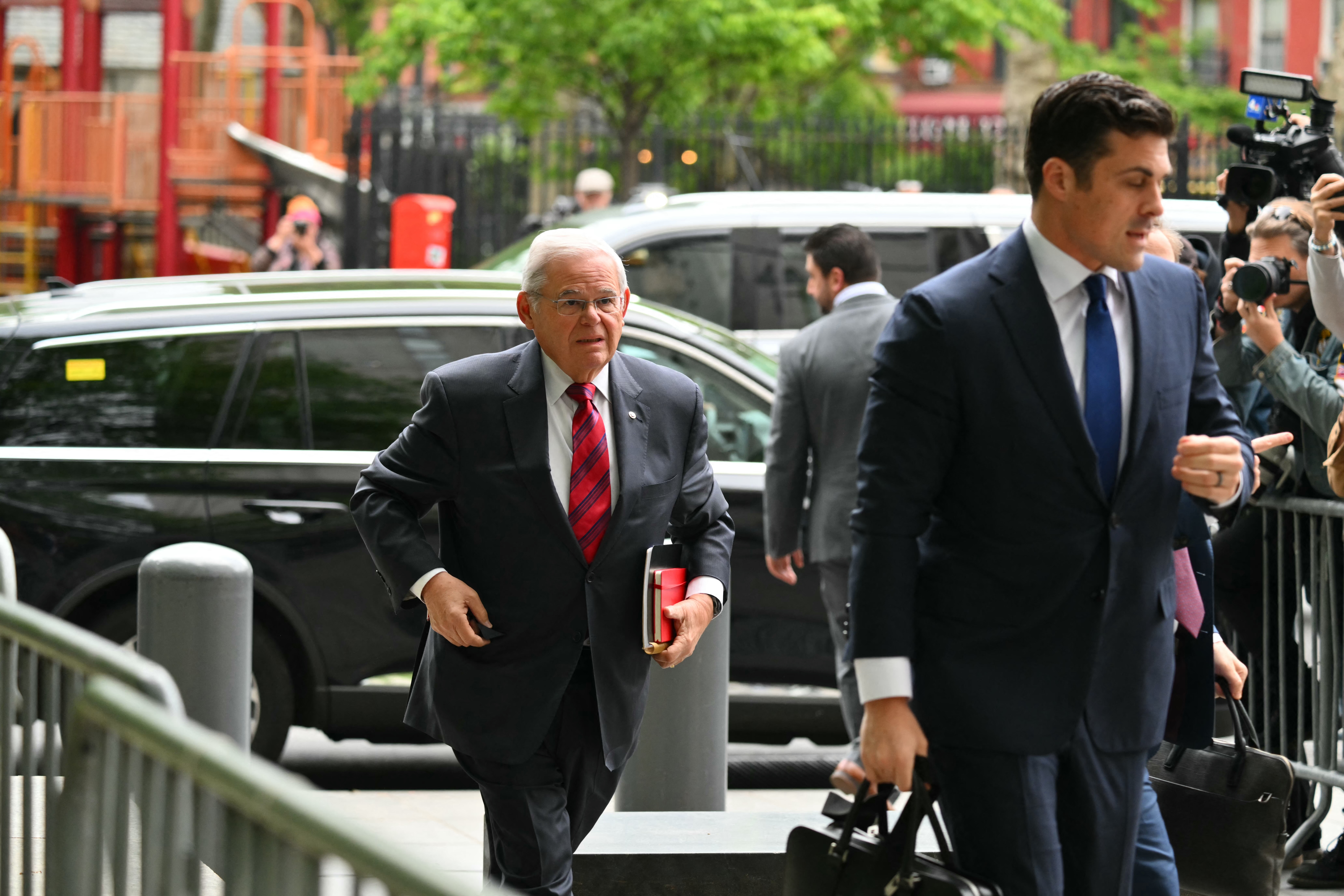 US Senator Bob Menendez (C), Democrat of New Jersey, arrives at the Manhattan Federal Court, in New York City on May 13, 2024.
