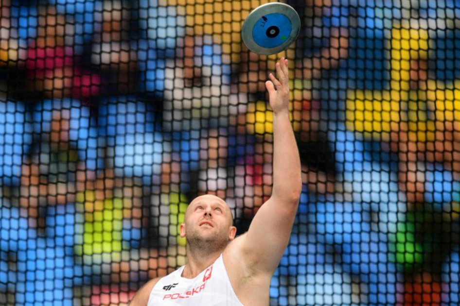 El polaco Piotr Malachowsk durante la prueba de lanzamiento de disco en los Juegos Olímpicos de Río 2016. / AFP