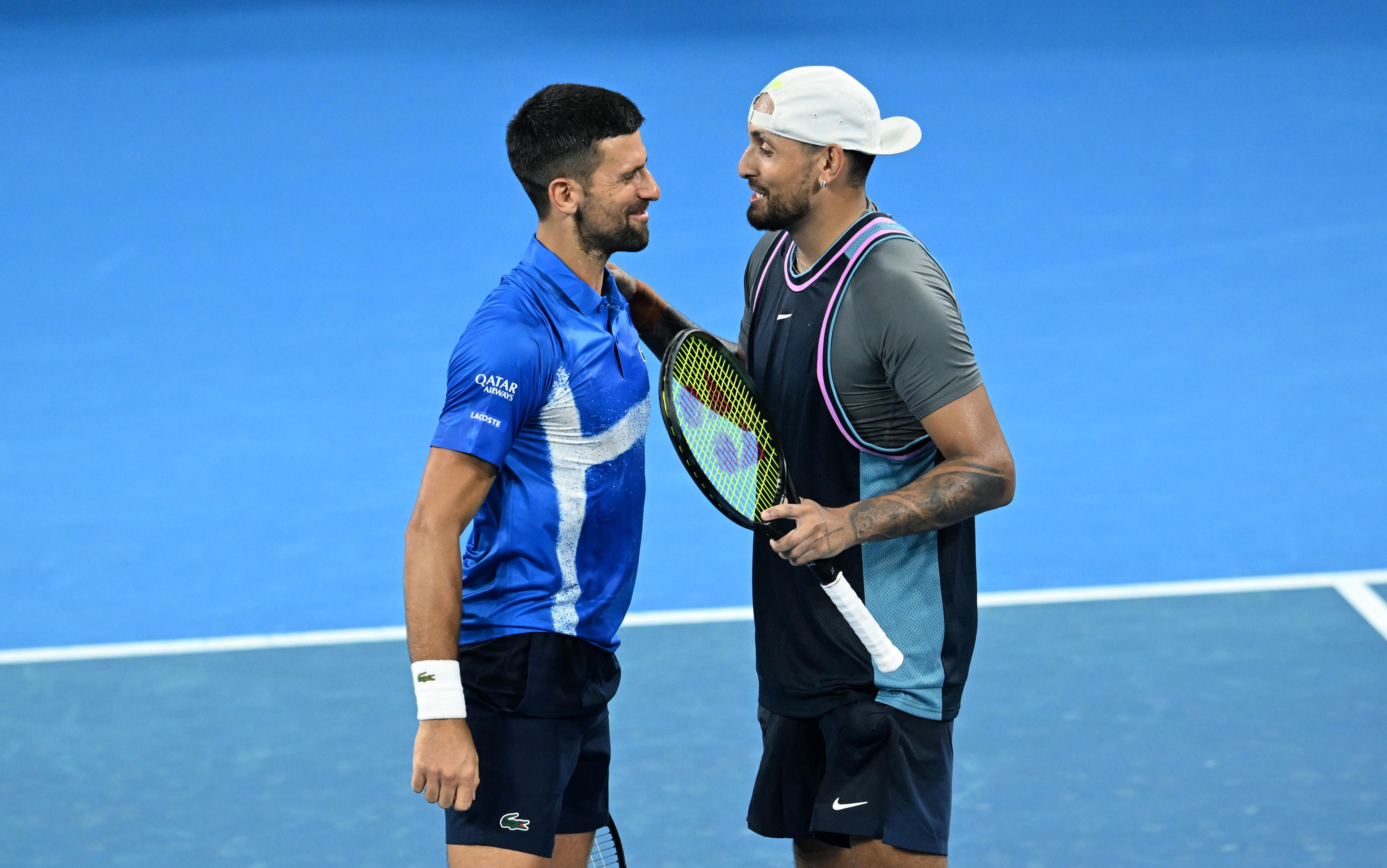 Brisbane (Australia), 30/12/2024.- Nick Kyrgios (L) of Australia and Novak Djokovic (R) of Serbia celebrate winning their doubles match against Alexander Erler of Austria and Andreas Mies of Germany at the Brisbane International tennis tournament in Brisbane, Australia, 30 December 2024. (Tenis, Alemania) EFE/EPA/DARREN ENGLAND AUSTRALIA AND NEW ZEALAND OUT