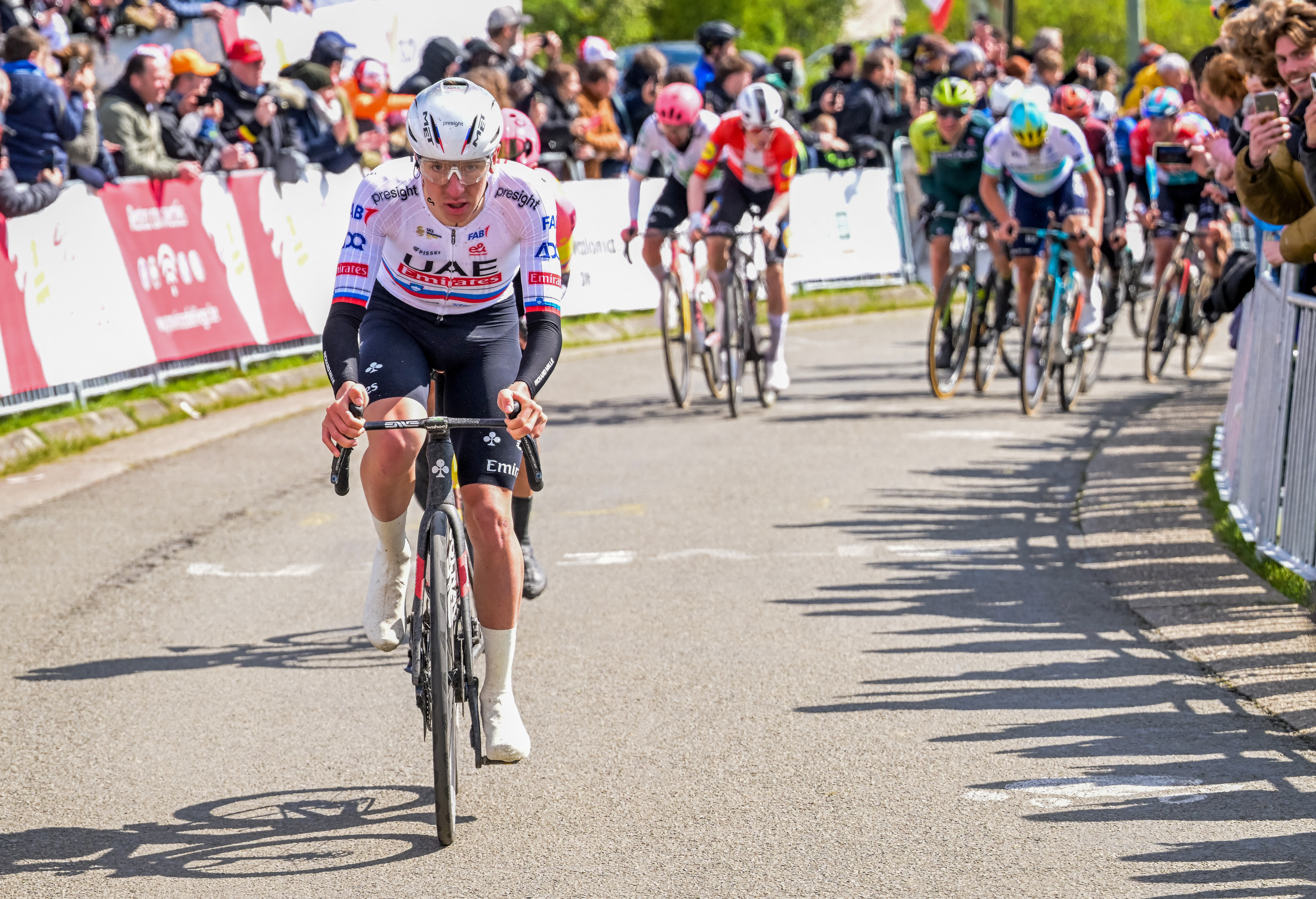UAE Team Emirates' Slovenian cyclist Tadej Pogacar (L) rides during Liege-Bastogne-Liege one day cycling race, 254,5 km round-trip from Liege to Liege via Bastogne, on April 21, 2024.