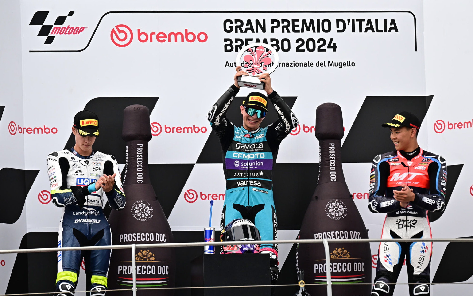 Scarperia (Italy), 02/06/2024.- Collin Veijer of Liqui Moly Husqvarna Intact GP (L) David Alonso CFMOTO Valresa Aspar Team (C) Ryusei Yamanaka MT Helmets - MSI (R) celebrate on the podium for the Moto 3 race of the Motorcycling Grand Prix of Italy at the Mugello circuit in Scarperia, central Italy, 02 June 2024. (Motociclismo, Ciclismo, Italia) EFE/EPA/CLAUDIO GIOVANNINI